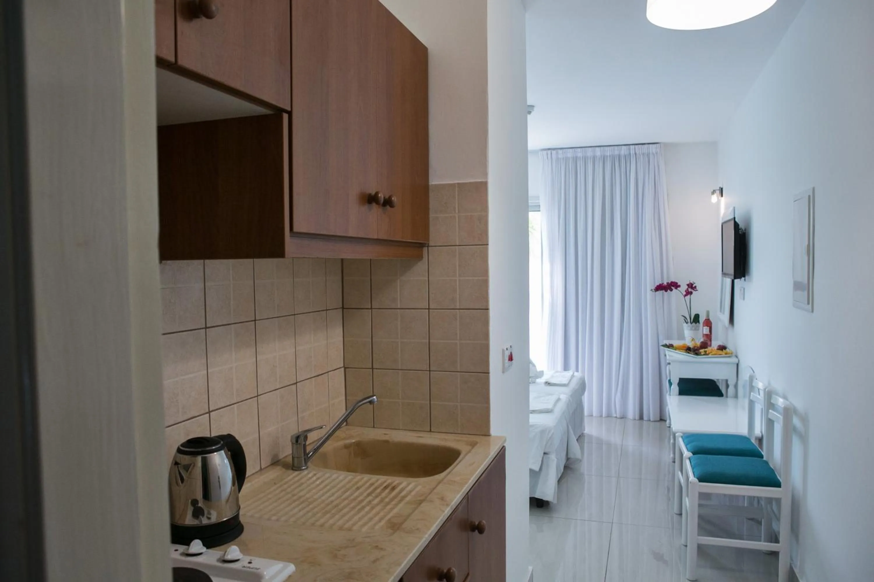 Kitchen or kitchenette in Mia Hotel Apartment