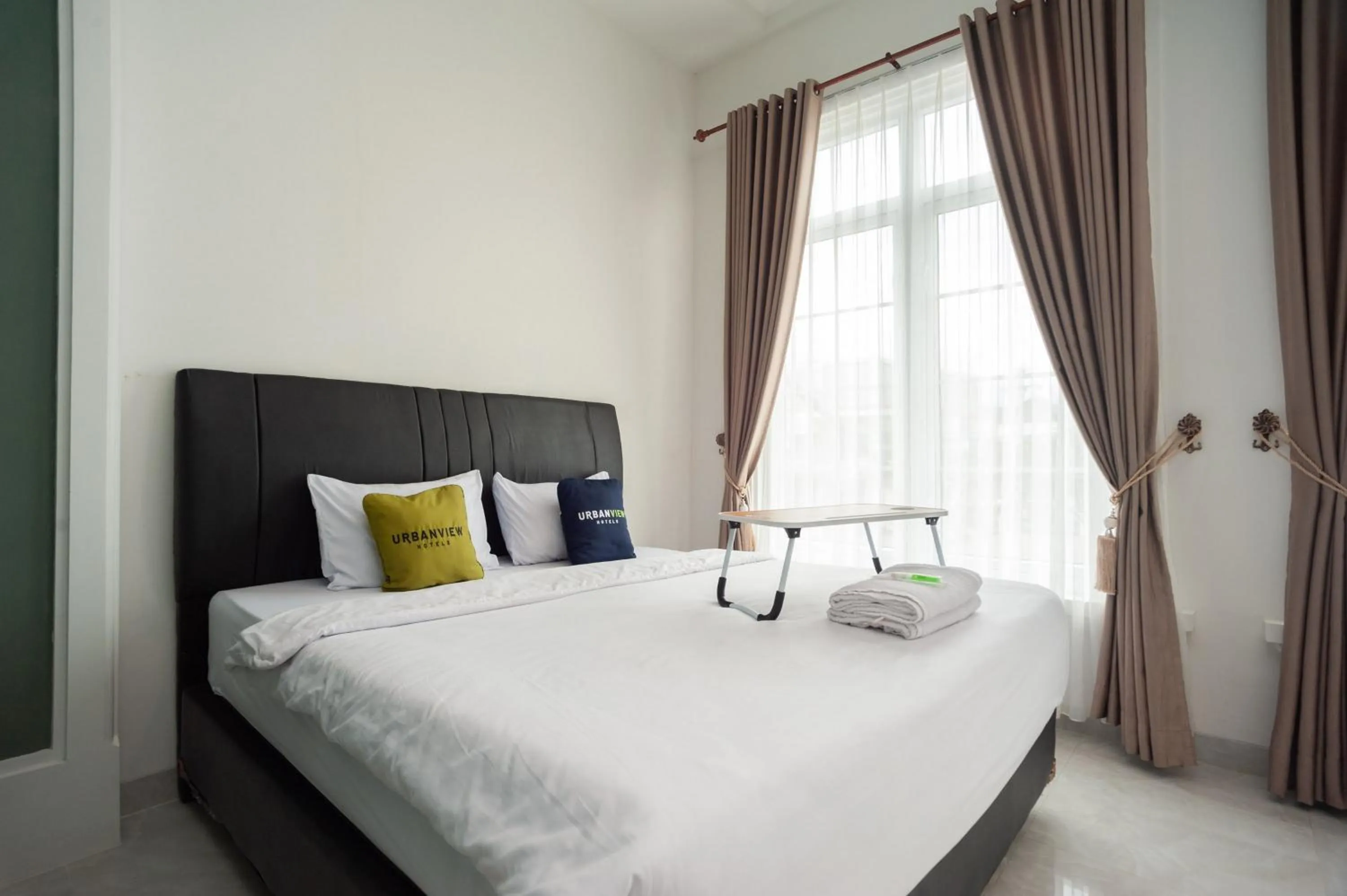 Bedroom, Bed in Urbanview Hotel Bong Gajah Lampung