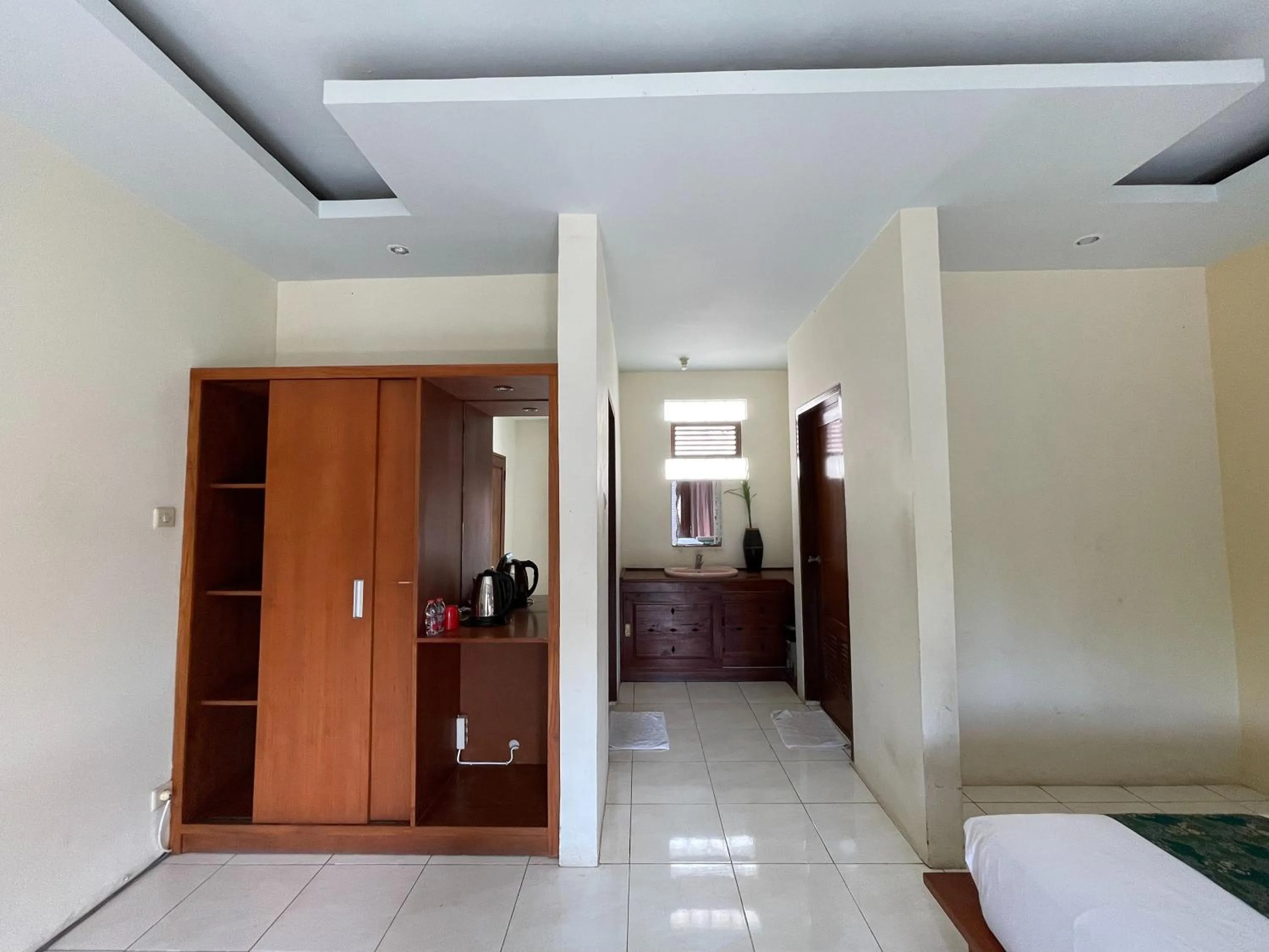 Bed in Melati Resort & Hotel Kuta Lombok