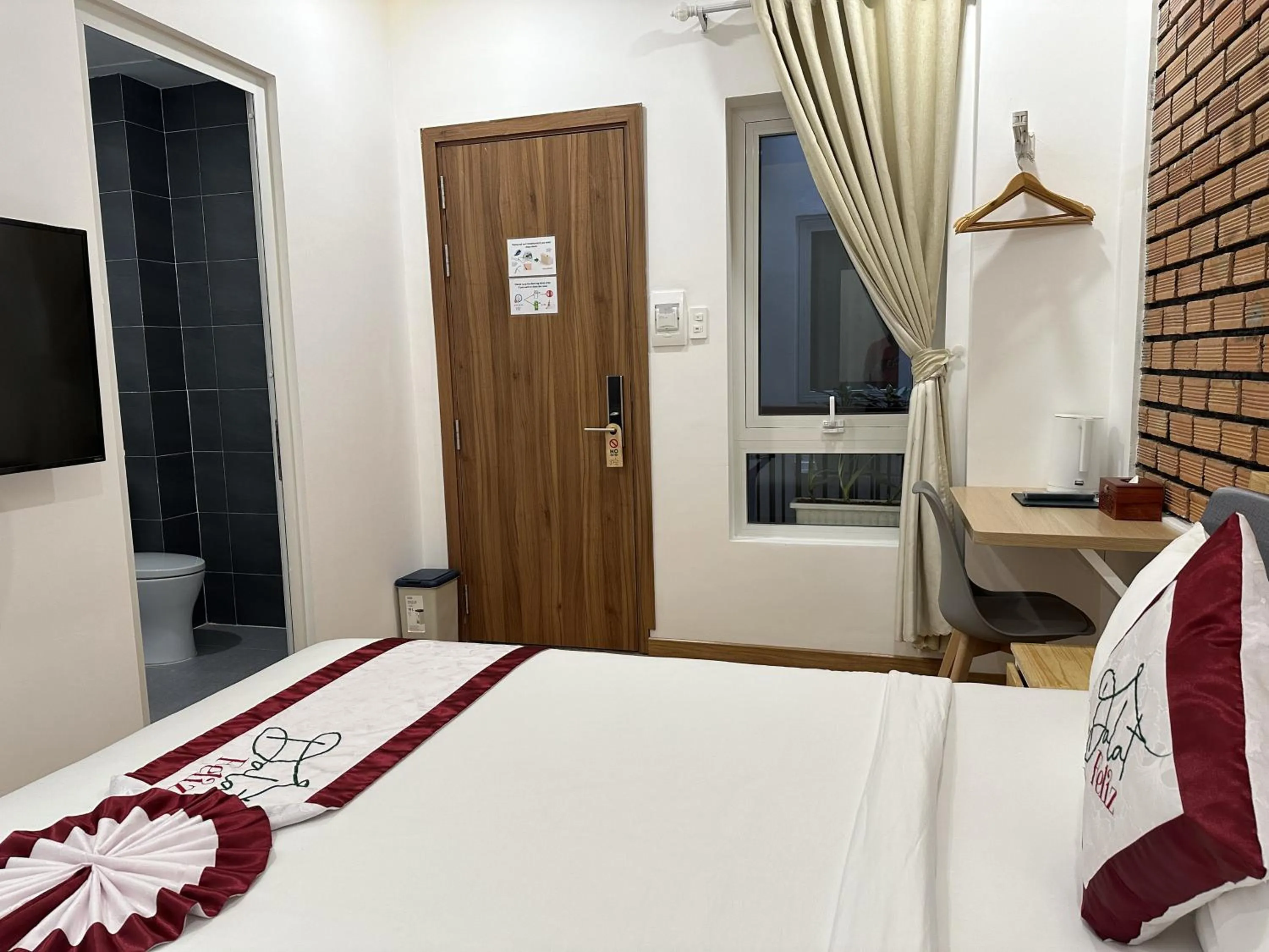 Seating area, Bed in Feliz Dalat Homestay