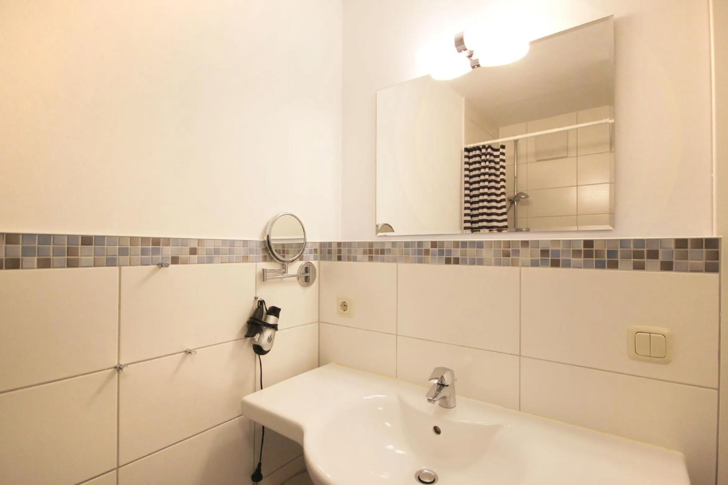 Shower in Villa Karina by Rujana