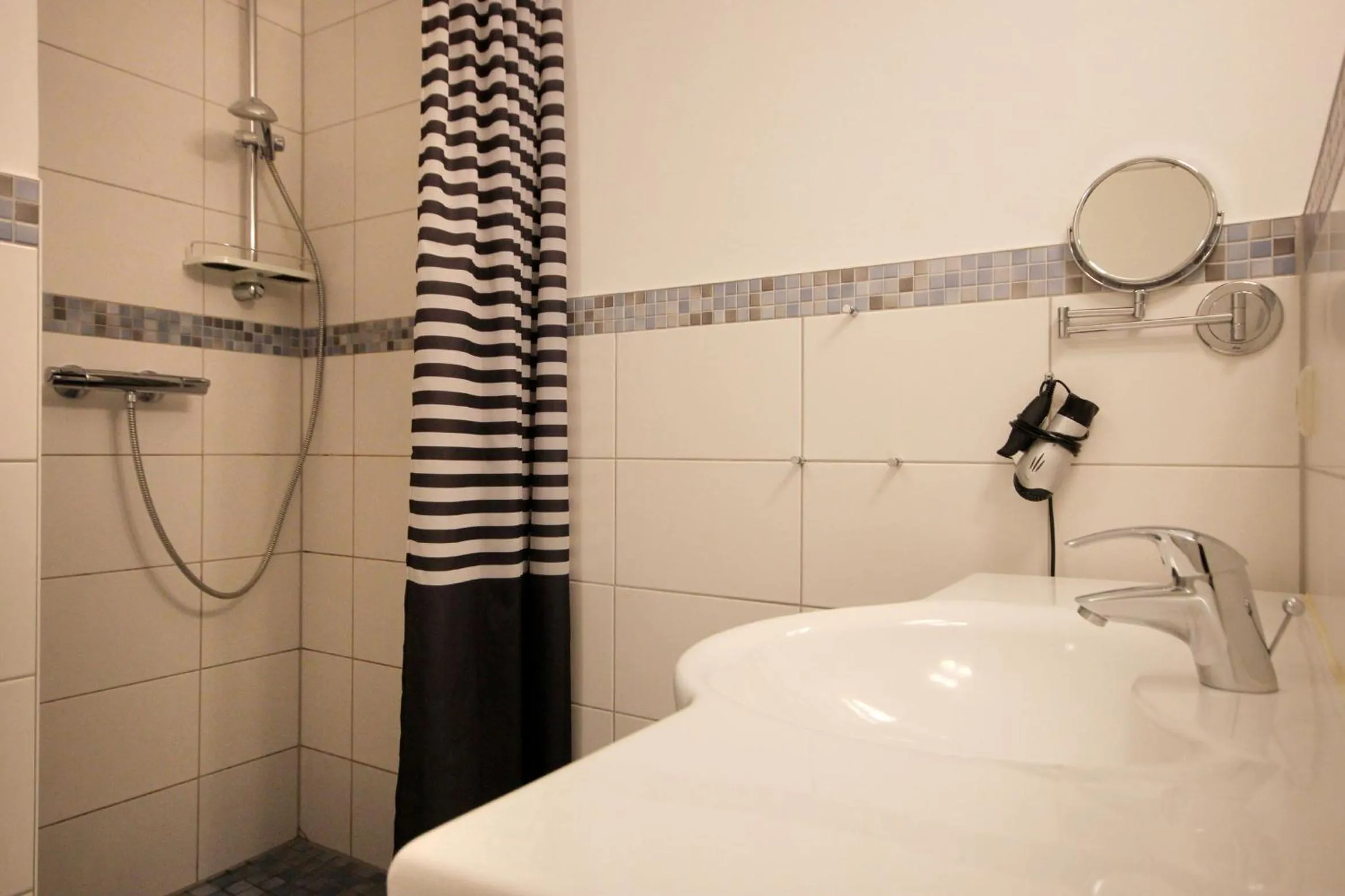 Shower in Villa Karina by Rujana