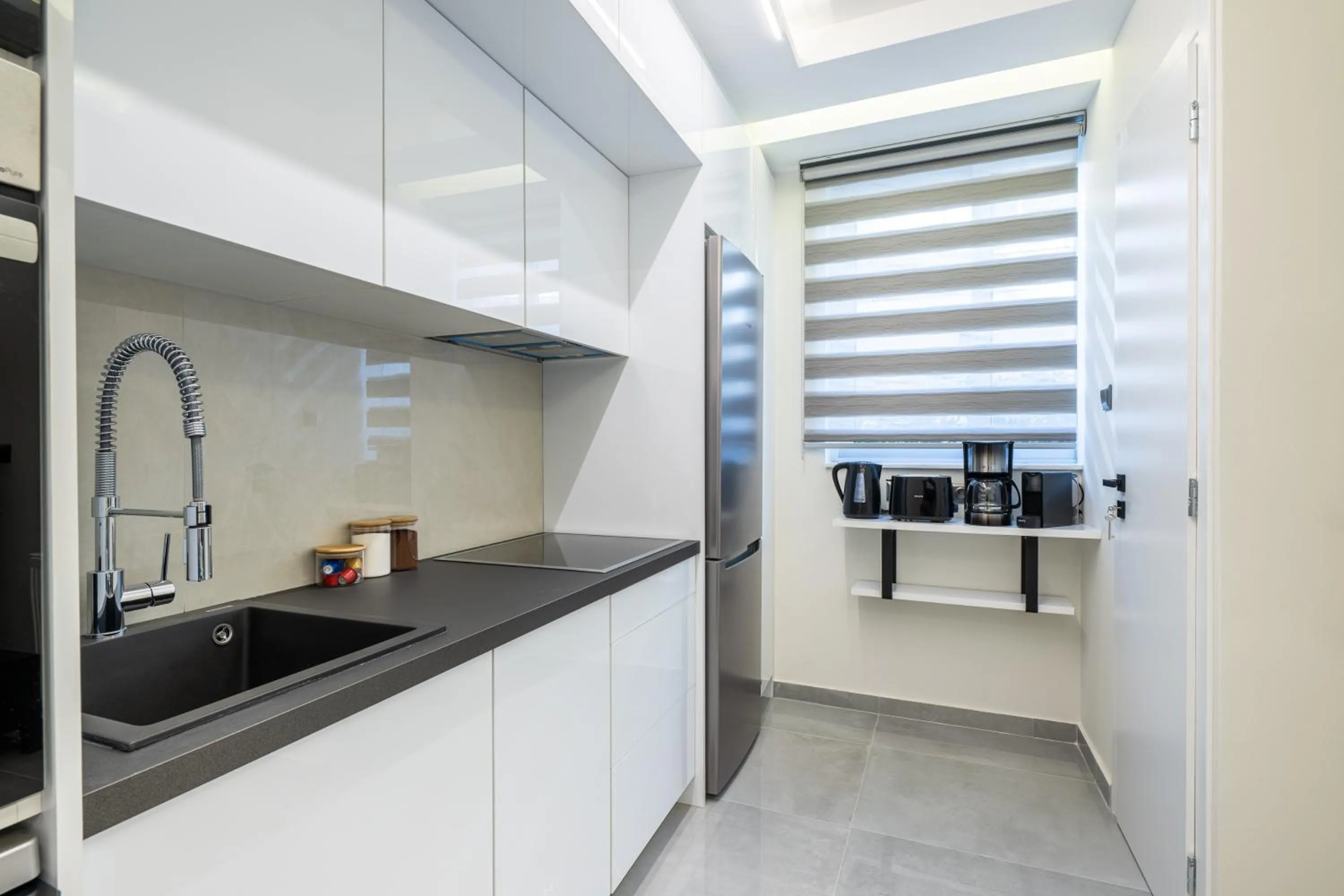 Kitchen or kitchenette in Acropolis Cozy Apartments