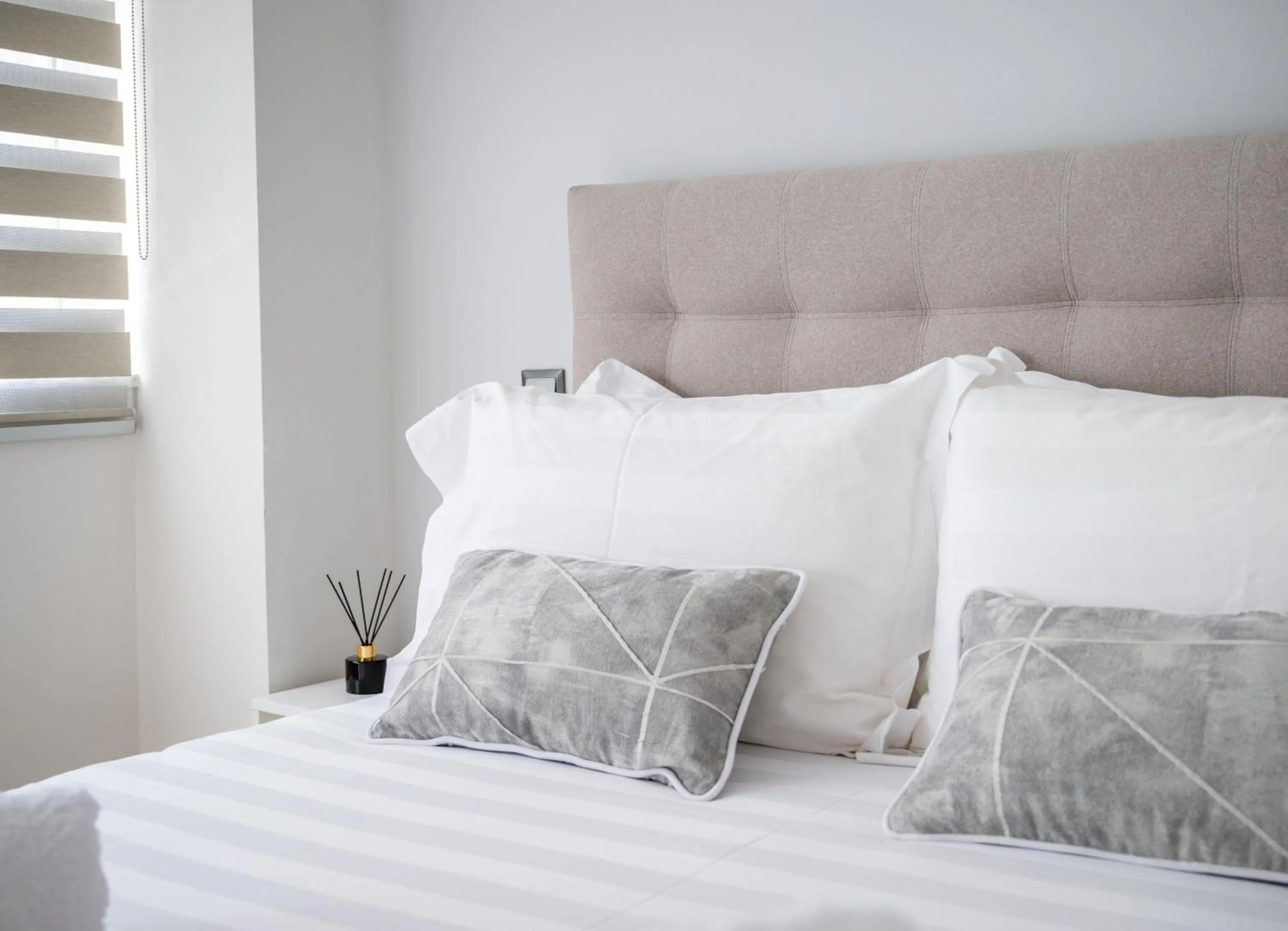 Bed in Acropolis Cozy Apartments