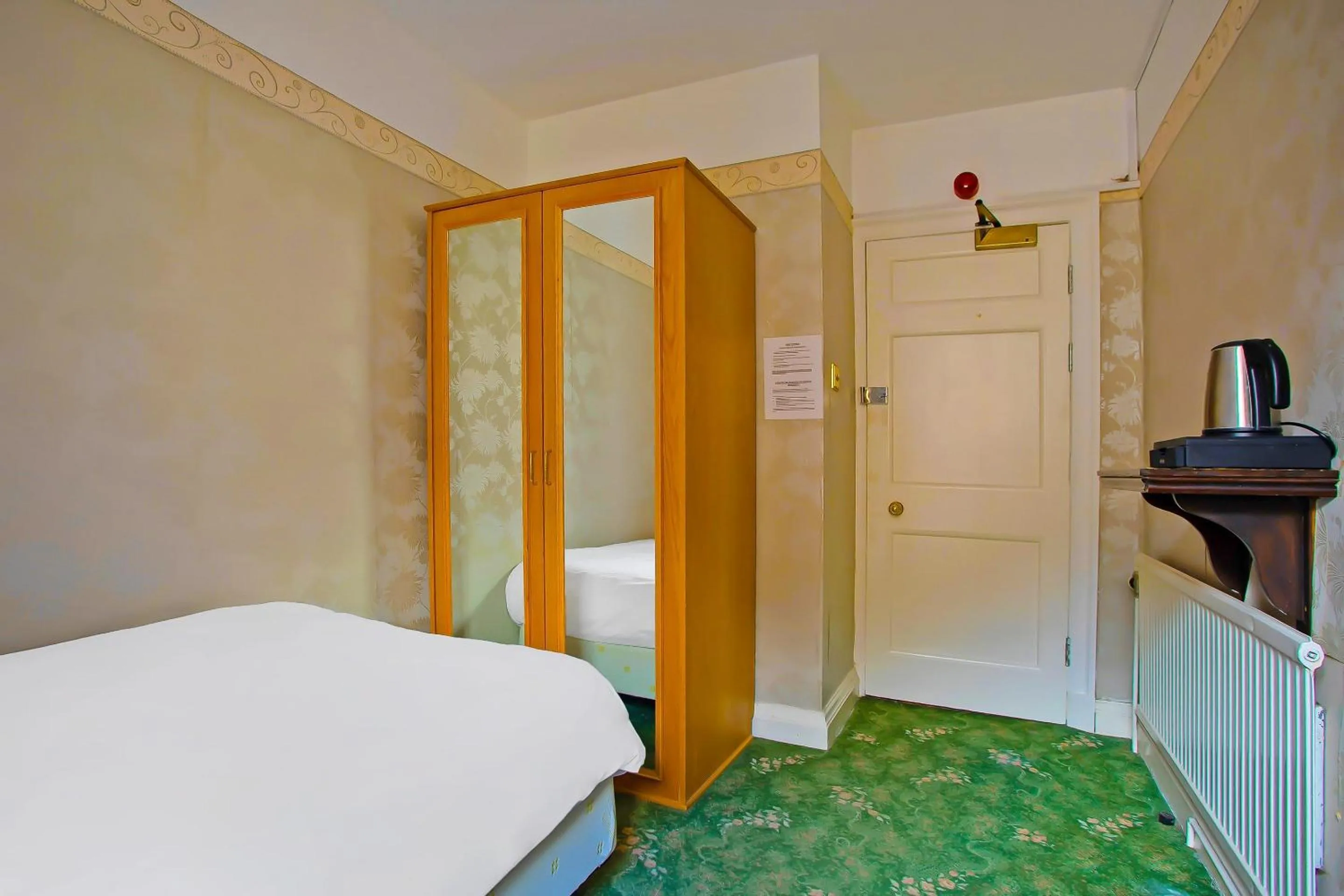 Bedroom in Great White Horse Hotel