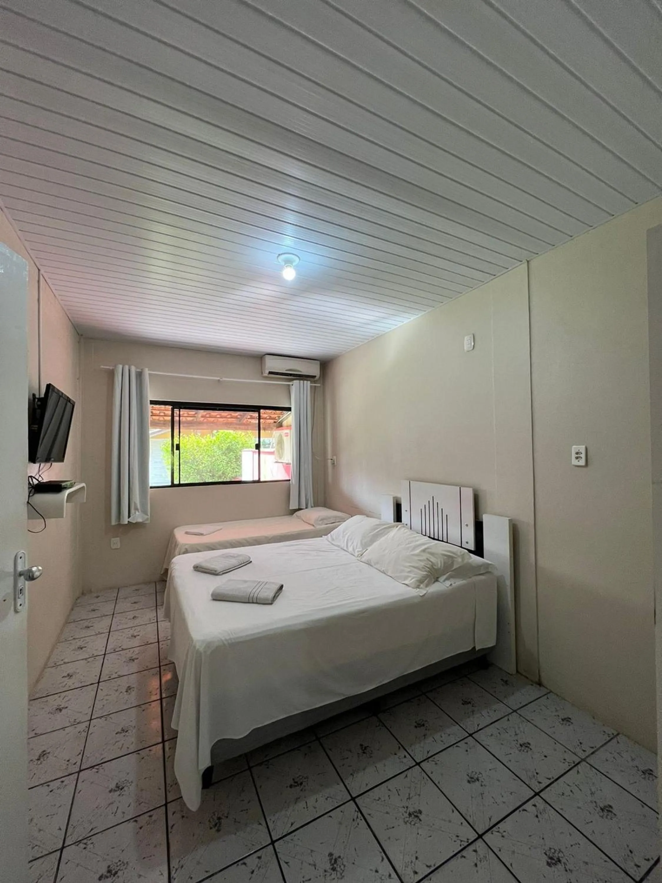 Bed in Recanto Armação Pousada