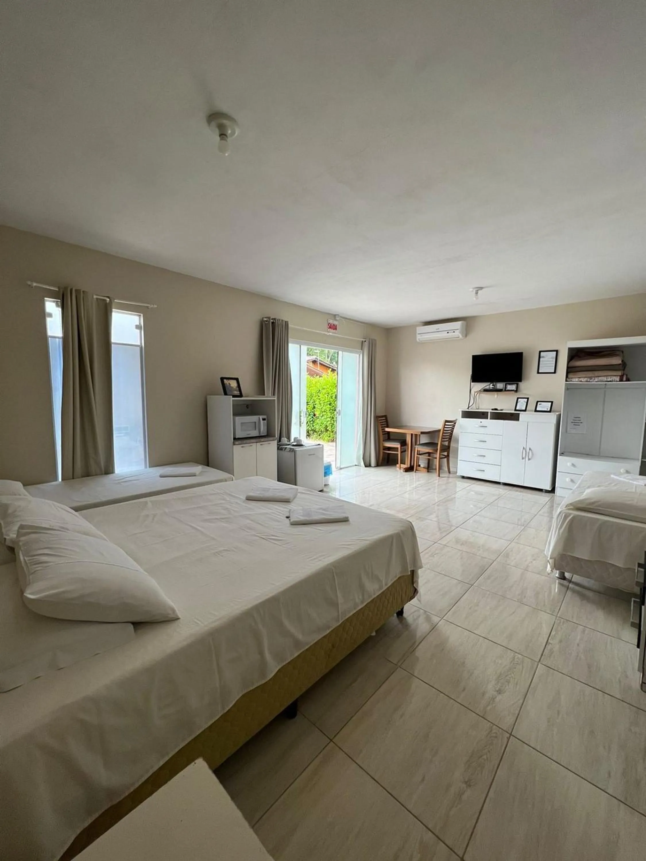 Bed in Recanto Armação Pousada