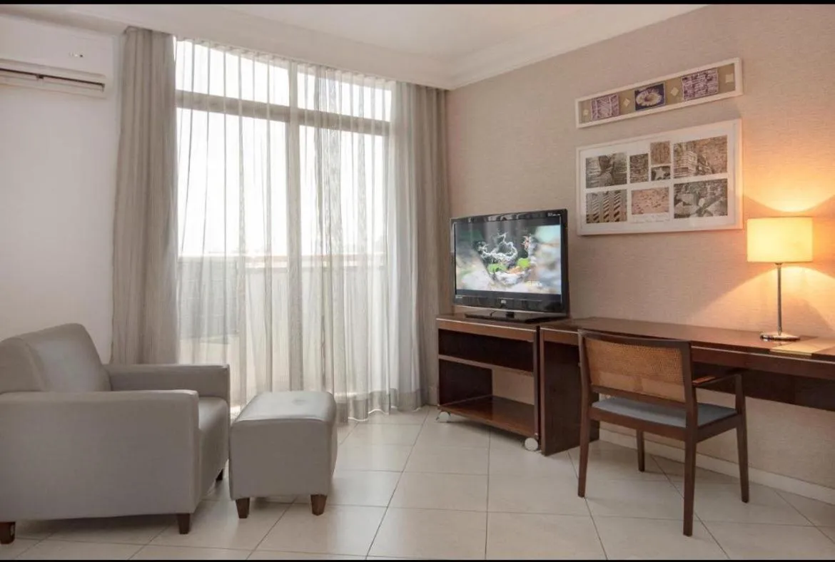 Communal lounge/ TV room in Millenium Hotel Flat