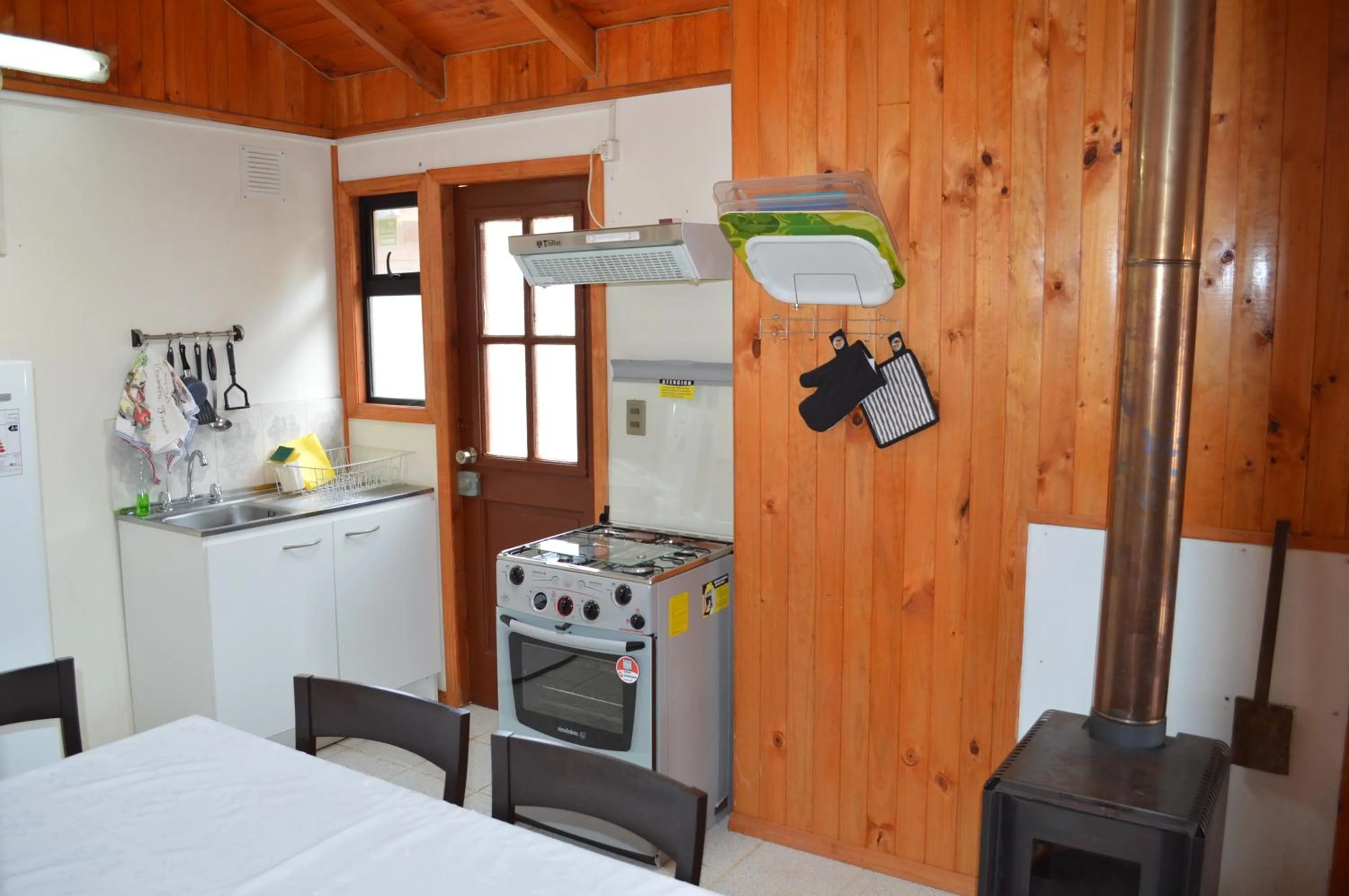 Kitchen or kitchenette in Cabañas del Teatro Frutillar