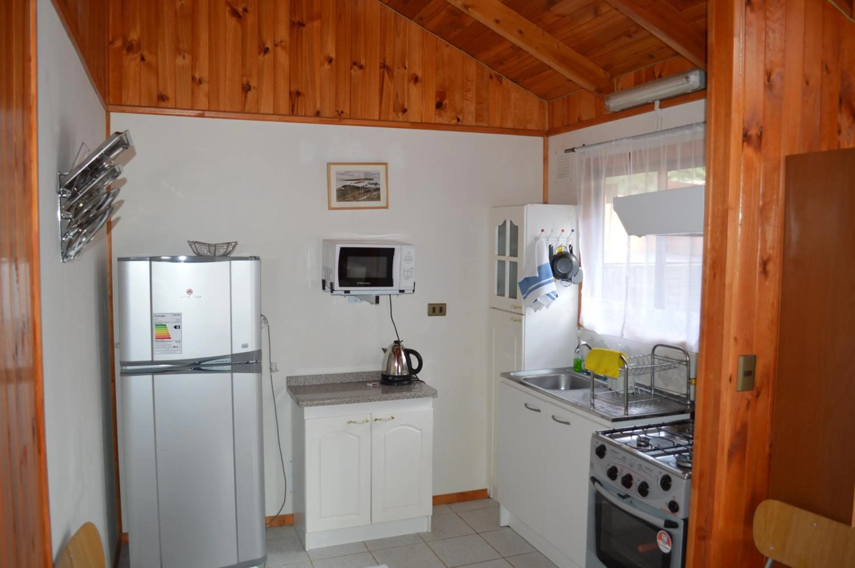Kitchen or kitchenette in Cabañas del Teatro Frutillar