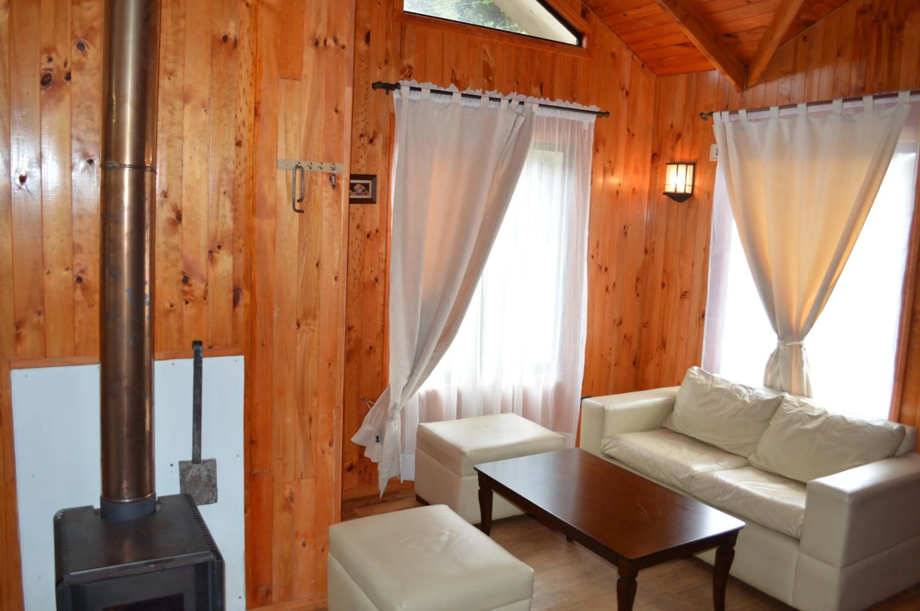 Communal lounge/ TV room in Cabañas del Teatro Frutillar