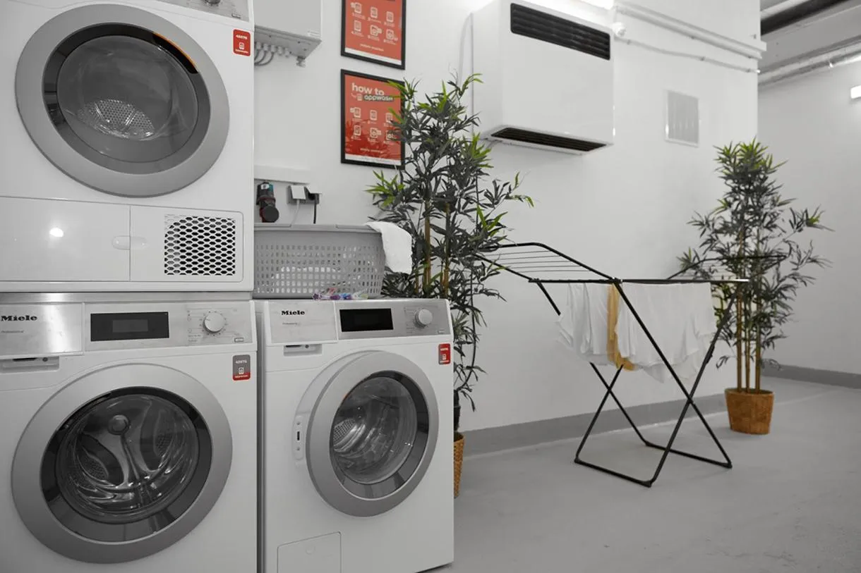 washing machine in SERVENTO Boardinghouse