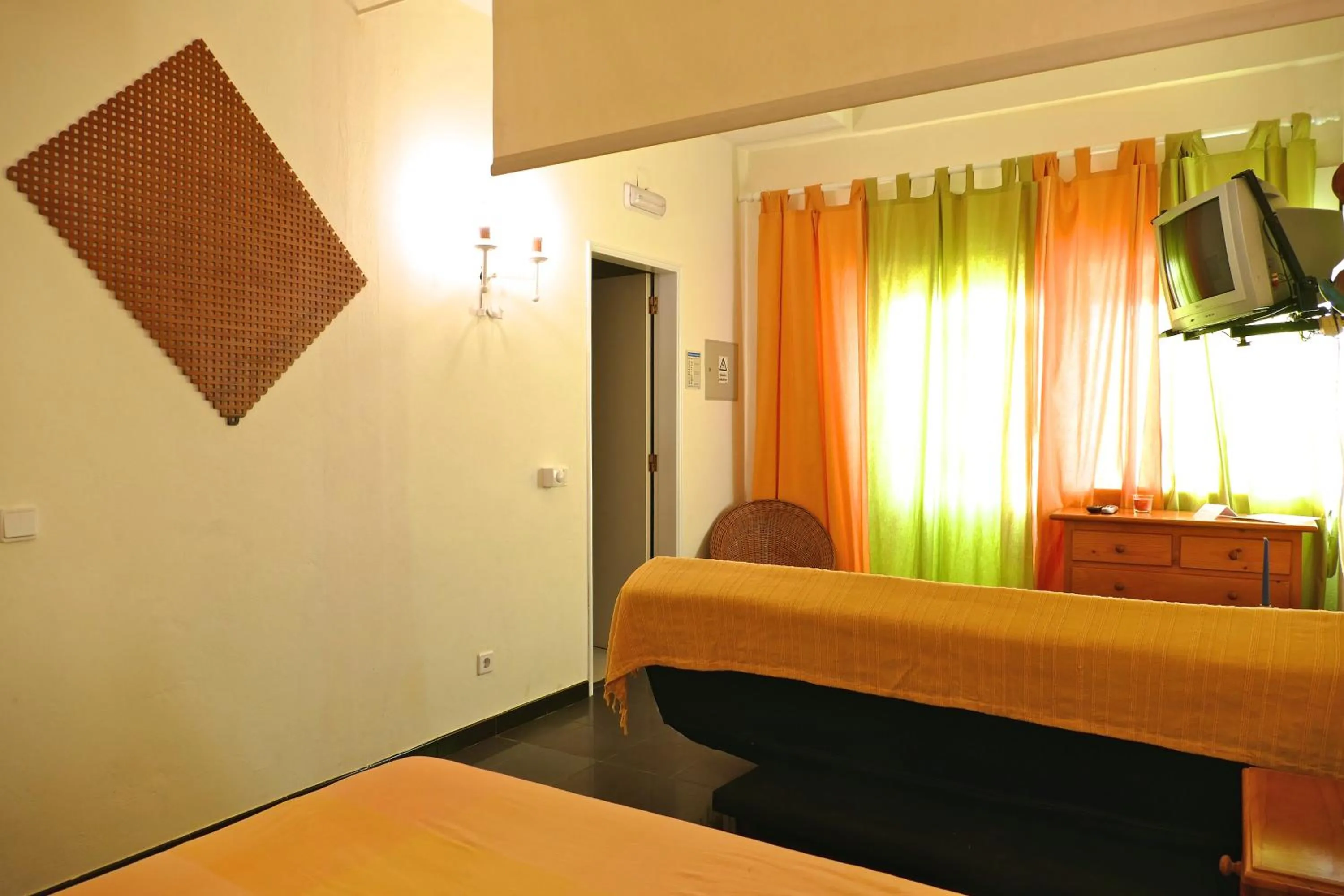 Bed in Apartamentos Barracuda