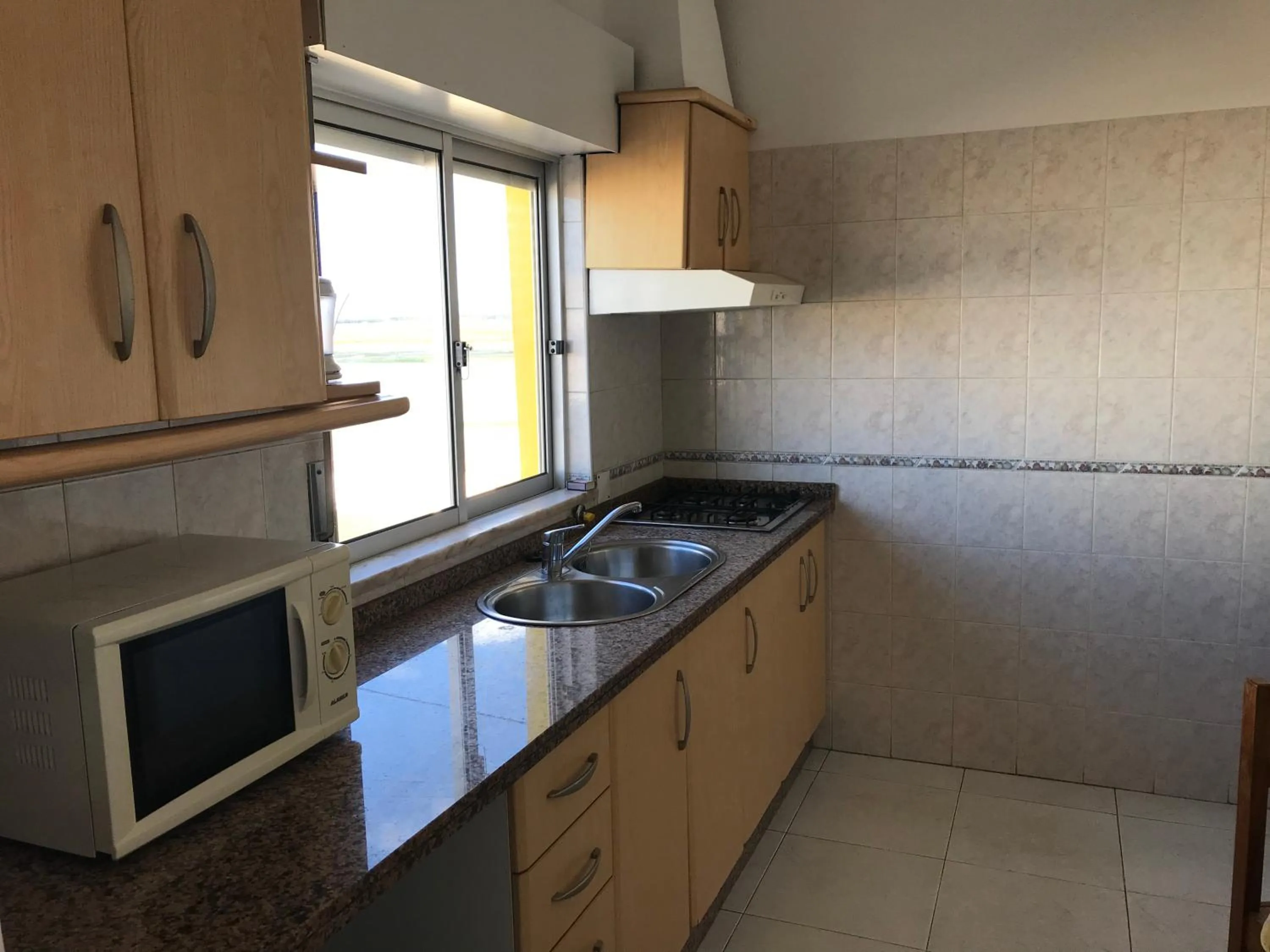 Kitchen or kitchenette in Apartamentos Barracuda