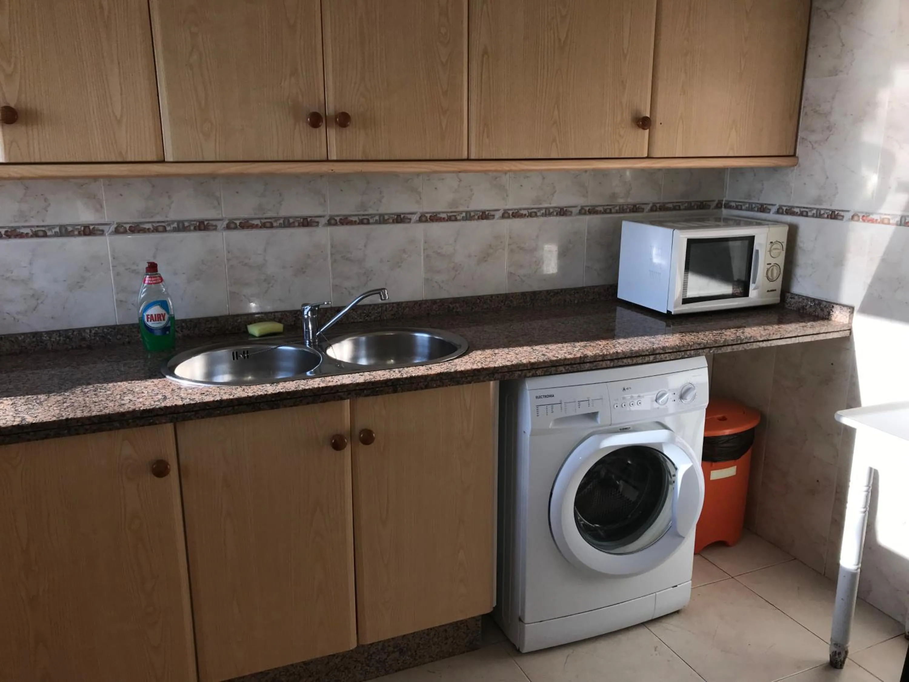 Kitchen or kitchenette in Apartamentos Barracuda