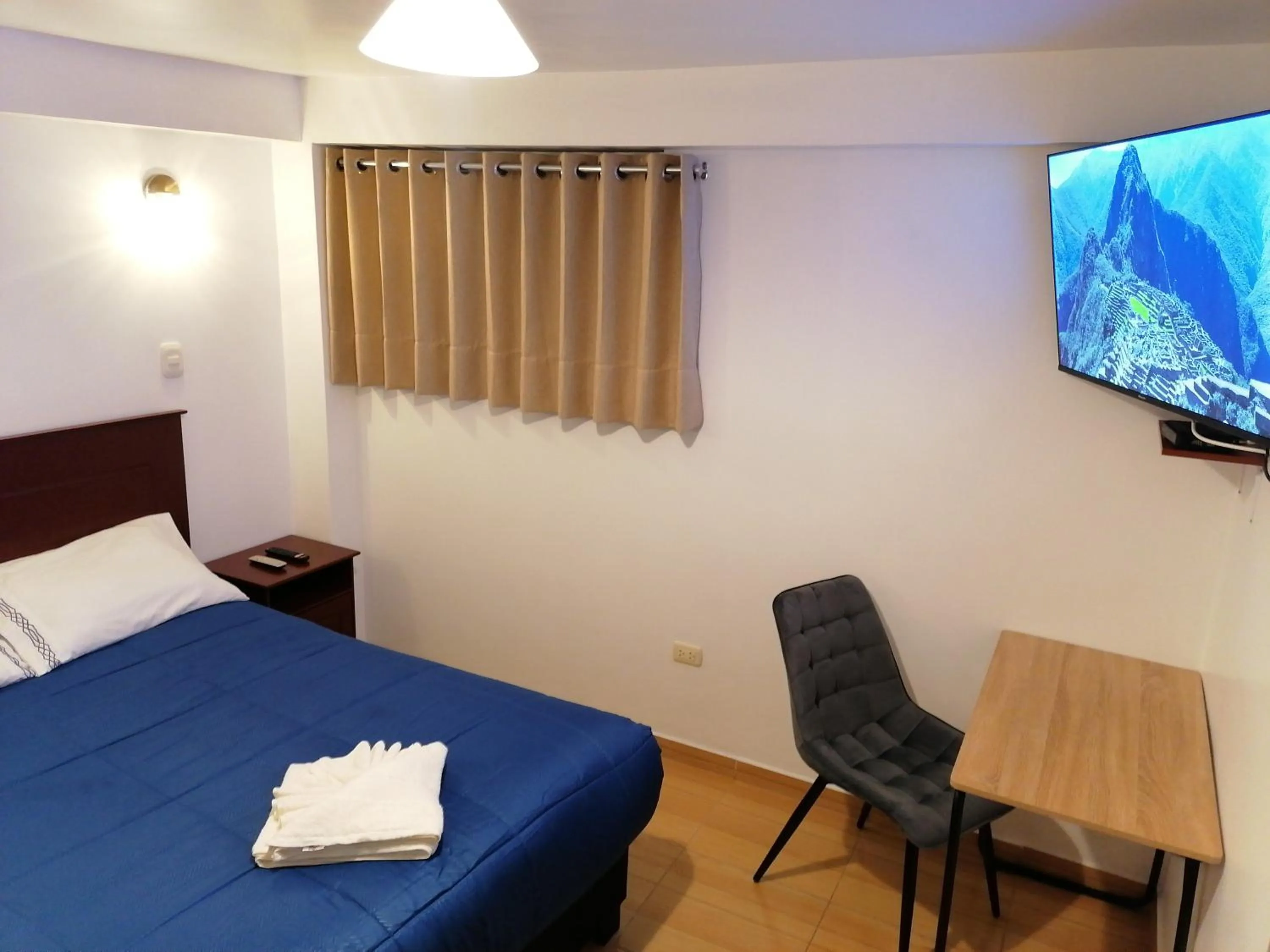 Bed in El Ave Azul Boutique Hotel Cusco