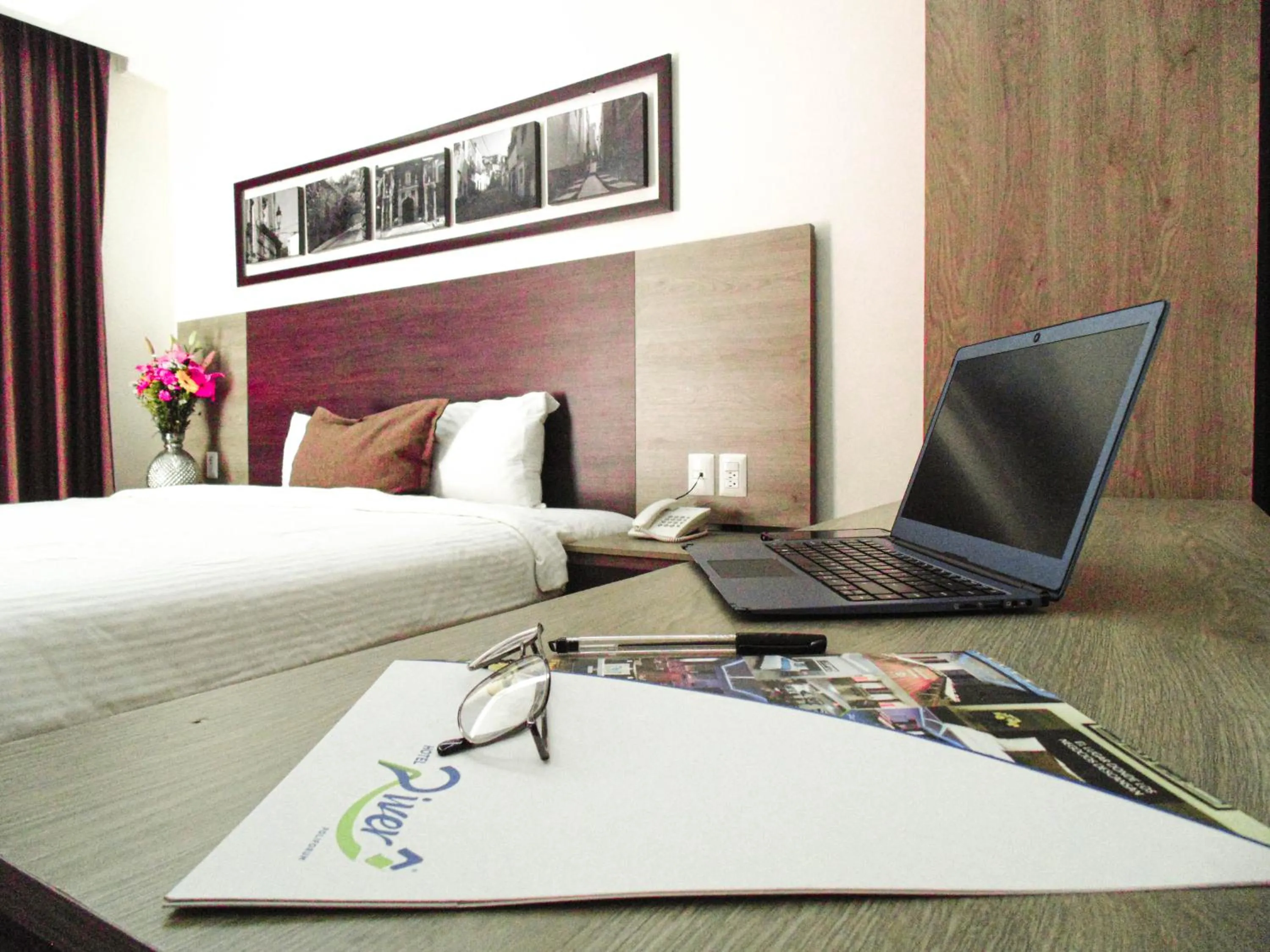 Bed in Hotel River Poliforum