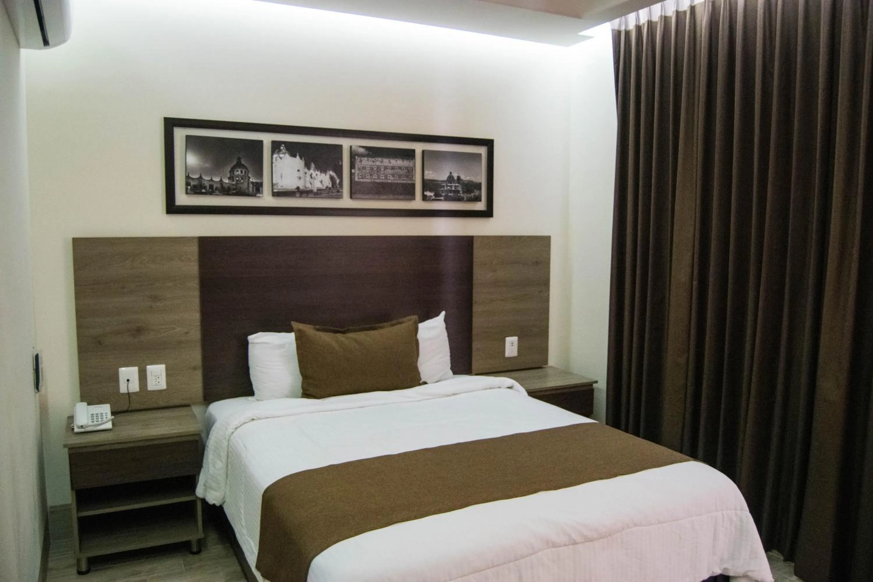 Bed in Hotel River Poliforum