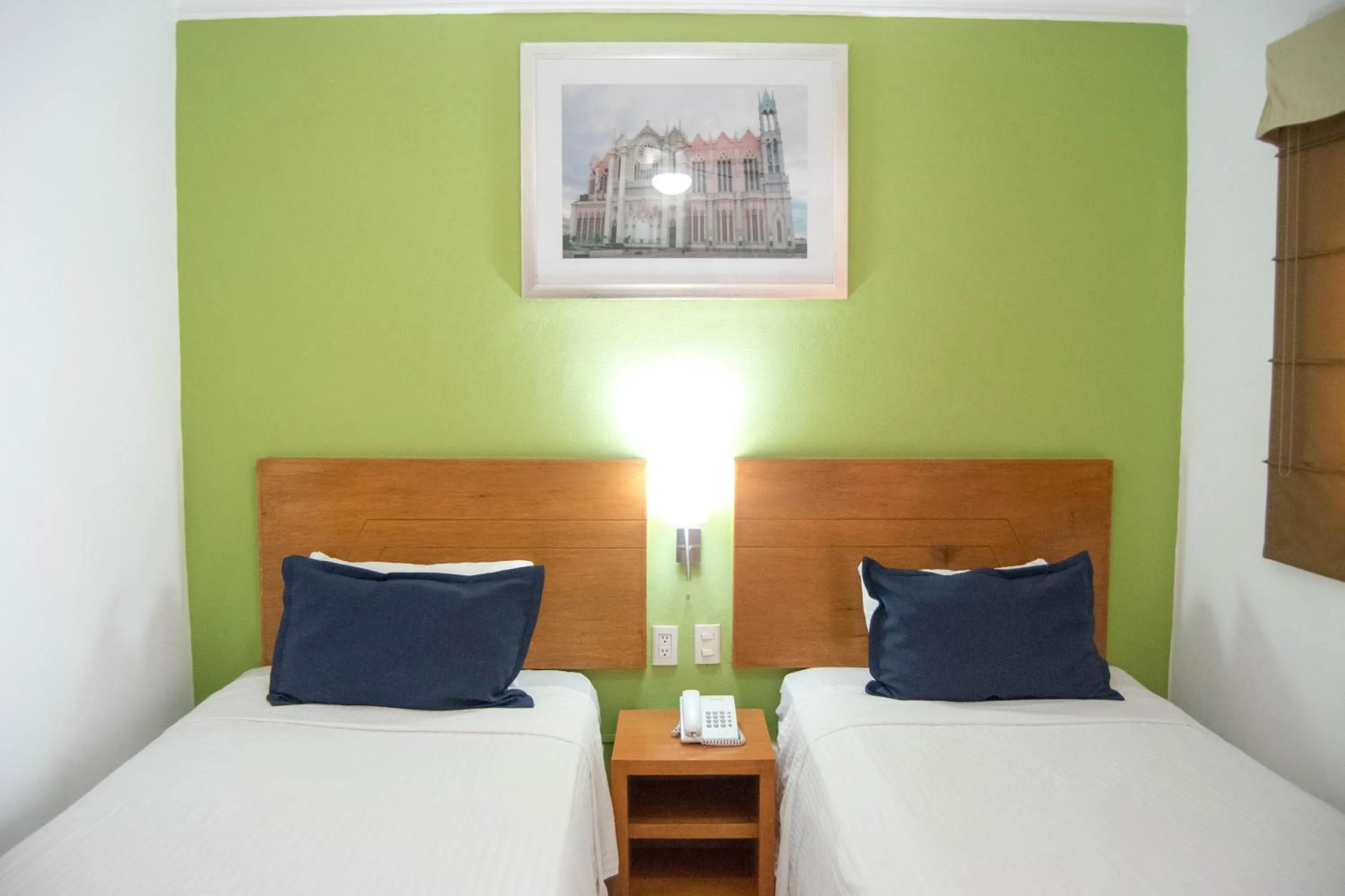 Bed in Hotel River Poliforum