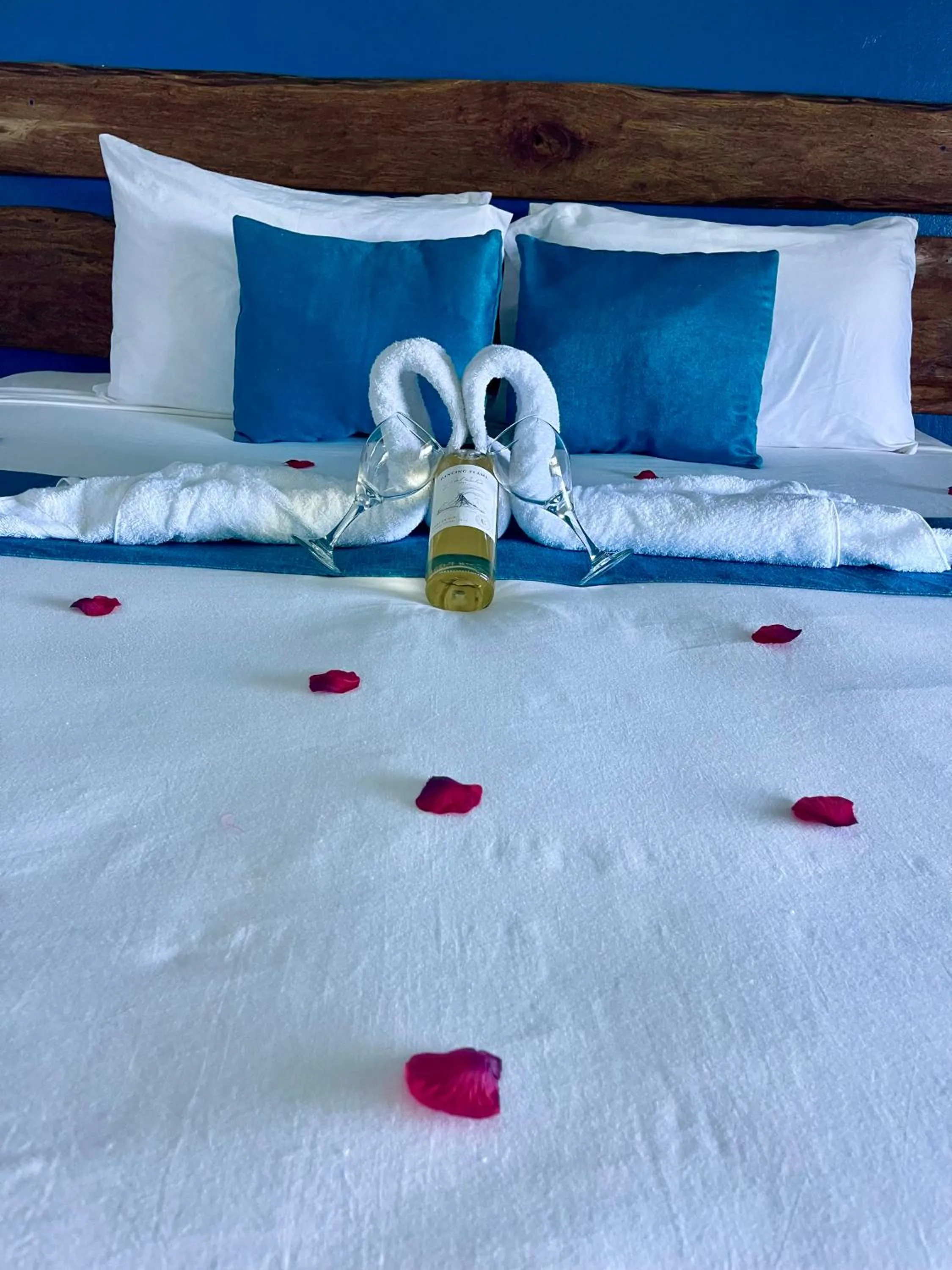 Bed in Sand and Tan Beach Hotel