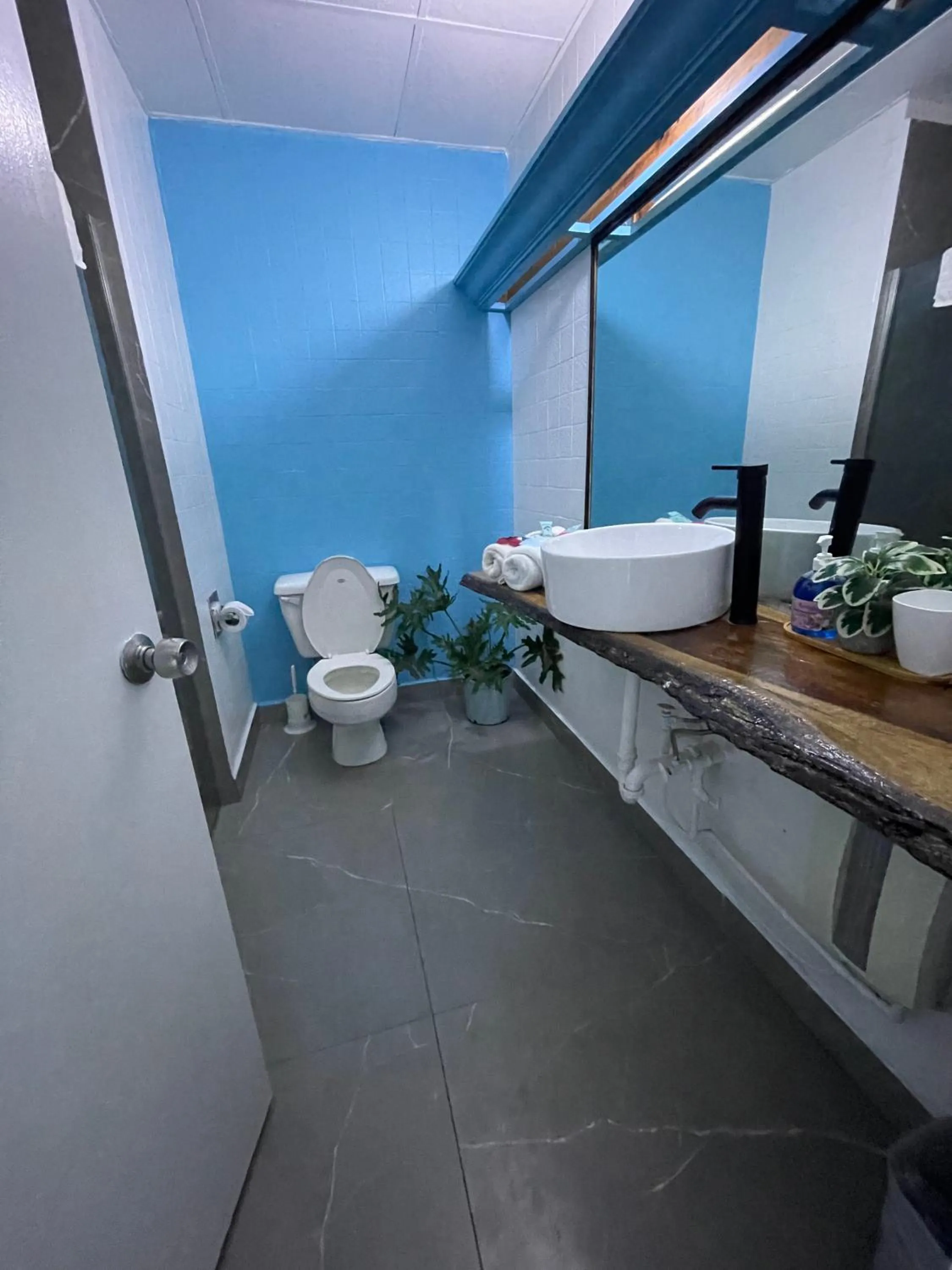 Bathroom in Sand and Tan Beach Hotel