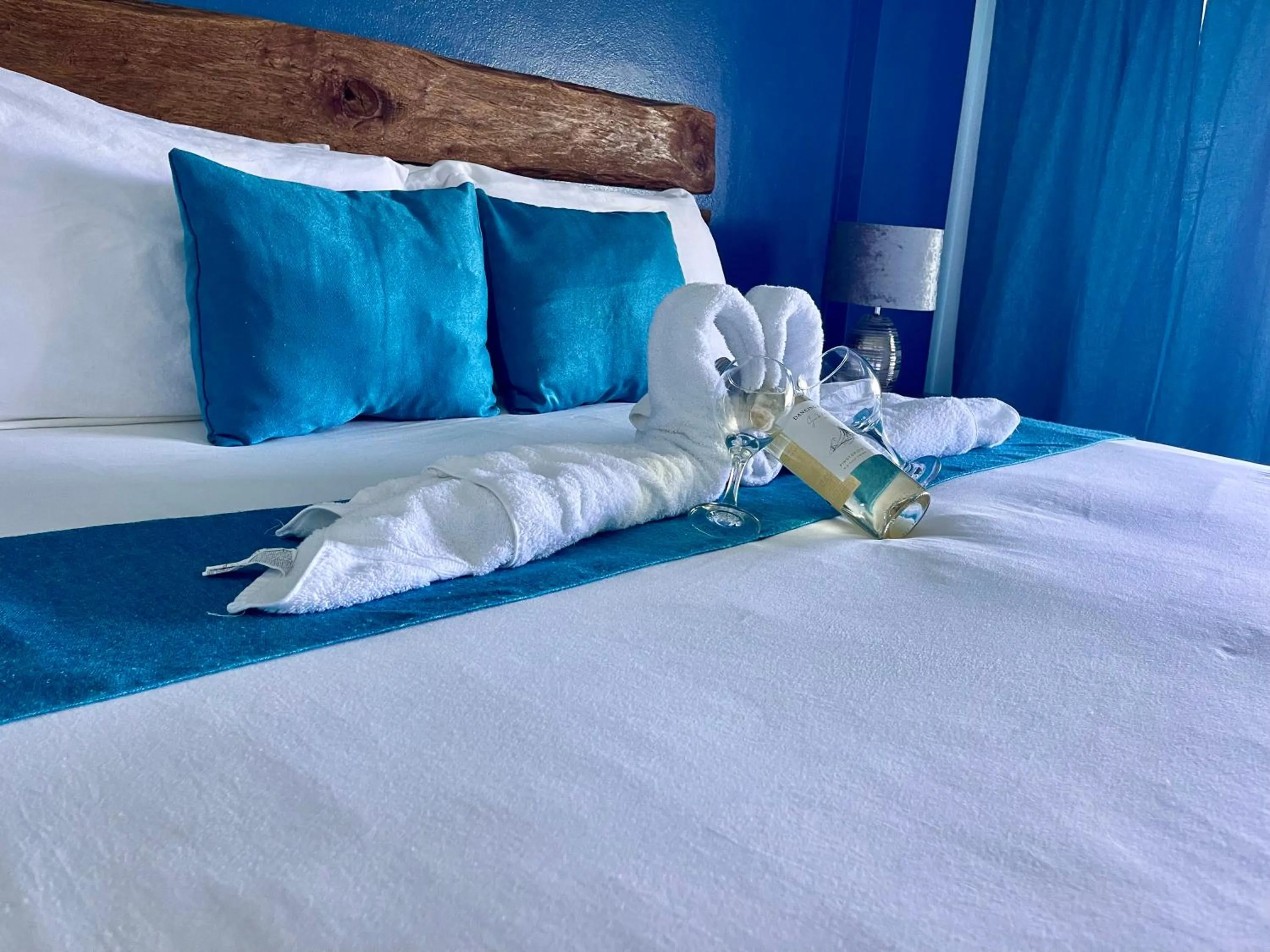 Bed in Sand and Tan Beach Hotel