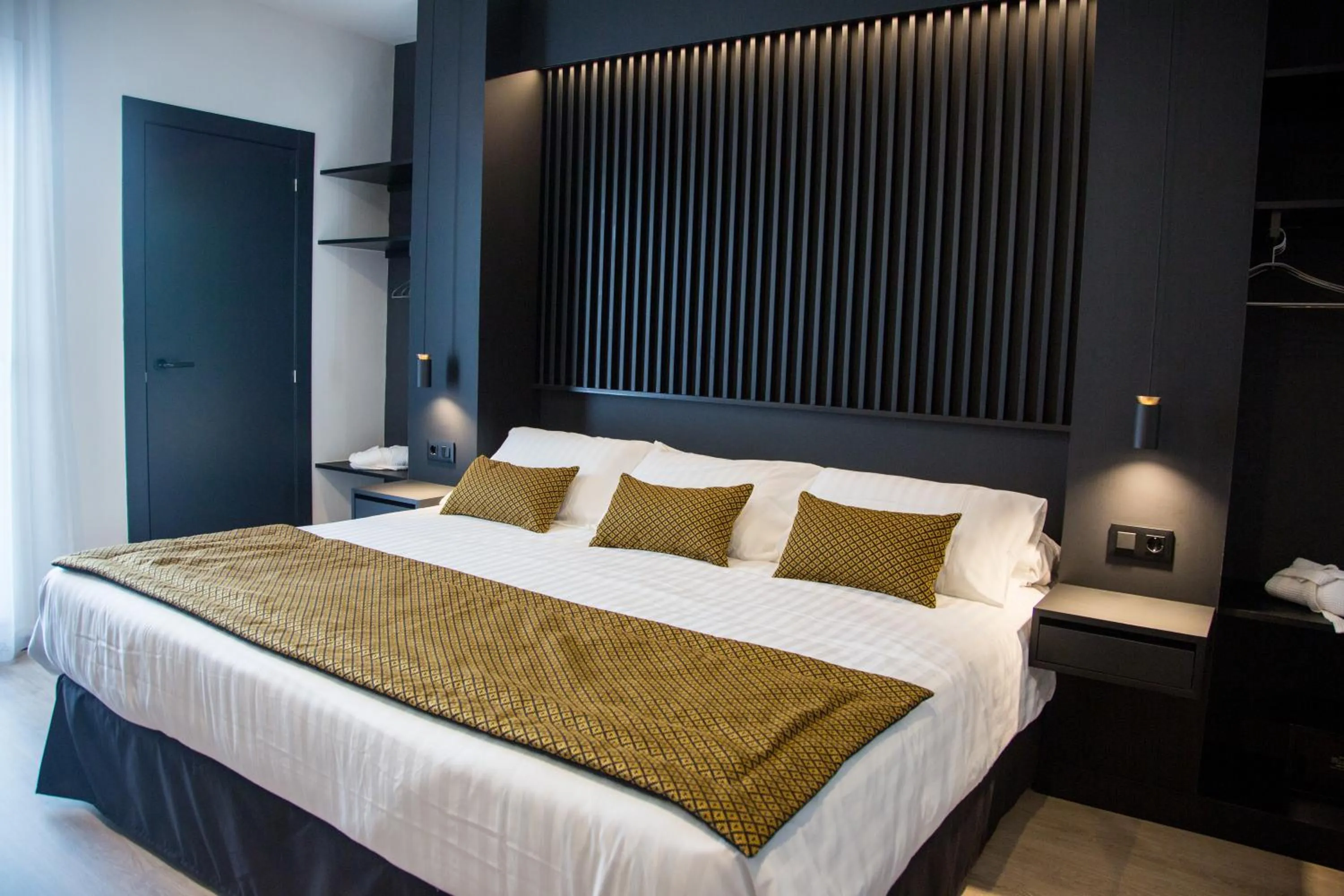 Bedroom, Bed in Elite Hotel - Gay Men Only