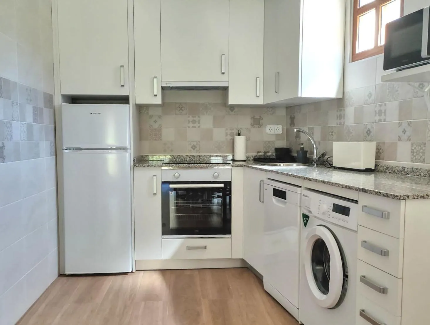 Kitchen or kitchenette in Apartamentos Javier