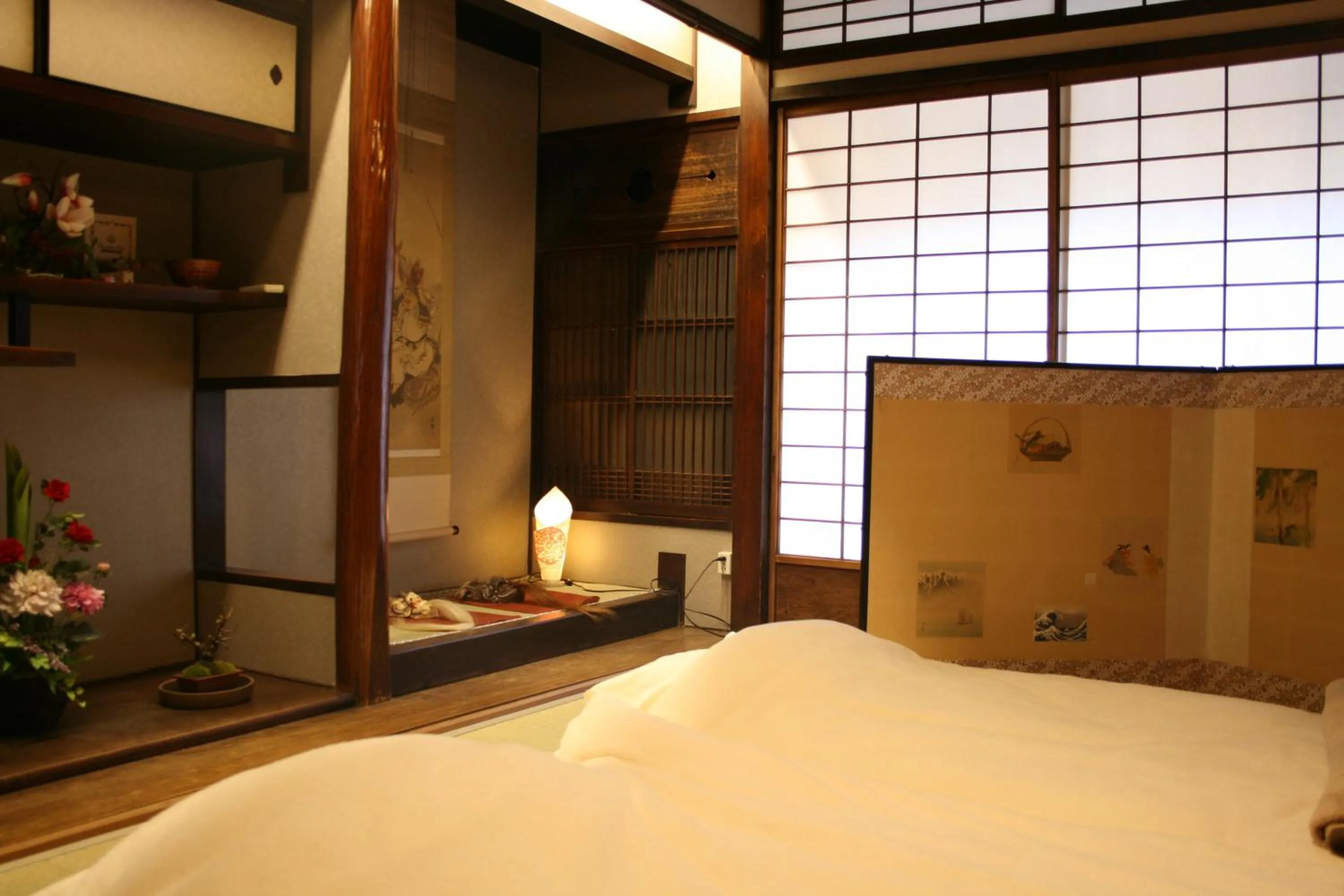 Bed in Guesthouse KYOTO COMPASS