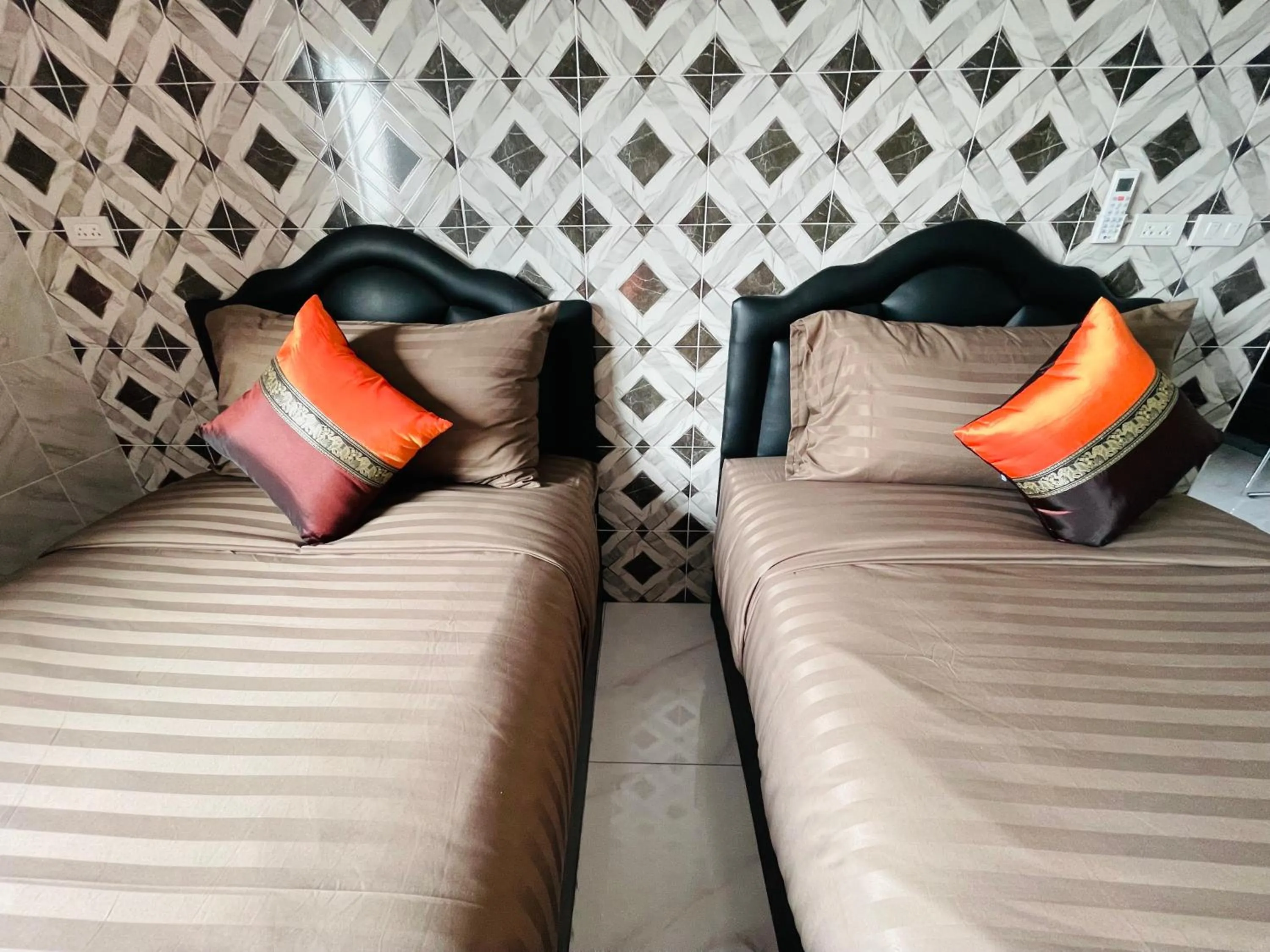 Bed in โรงแรมเรือนคุณเล็ก กานต์สินี