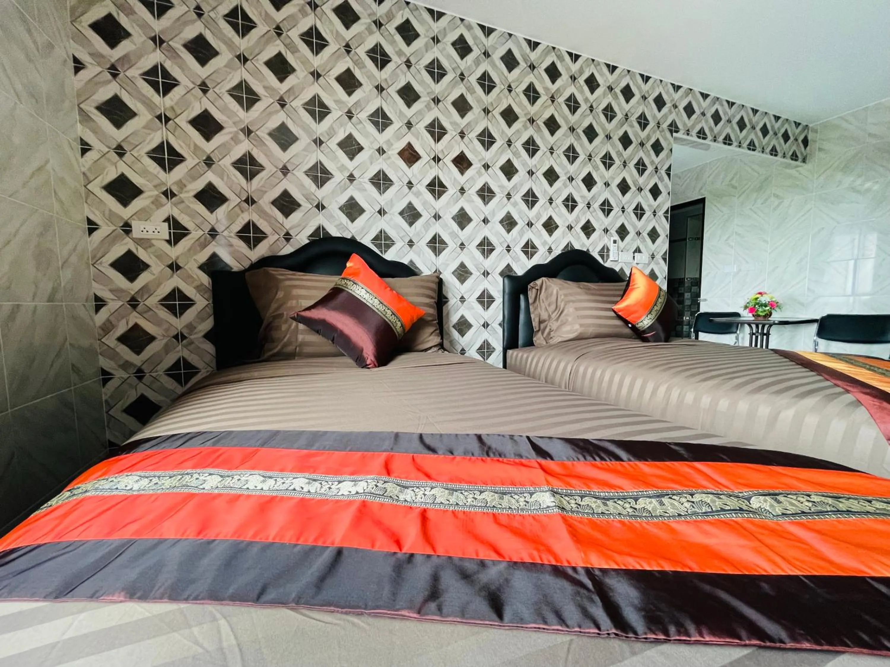 Bed in โรงแรมเรือนคุณเล็ก กานต์สินี