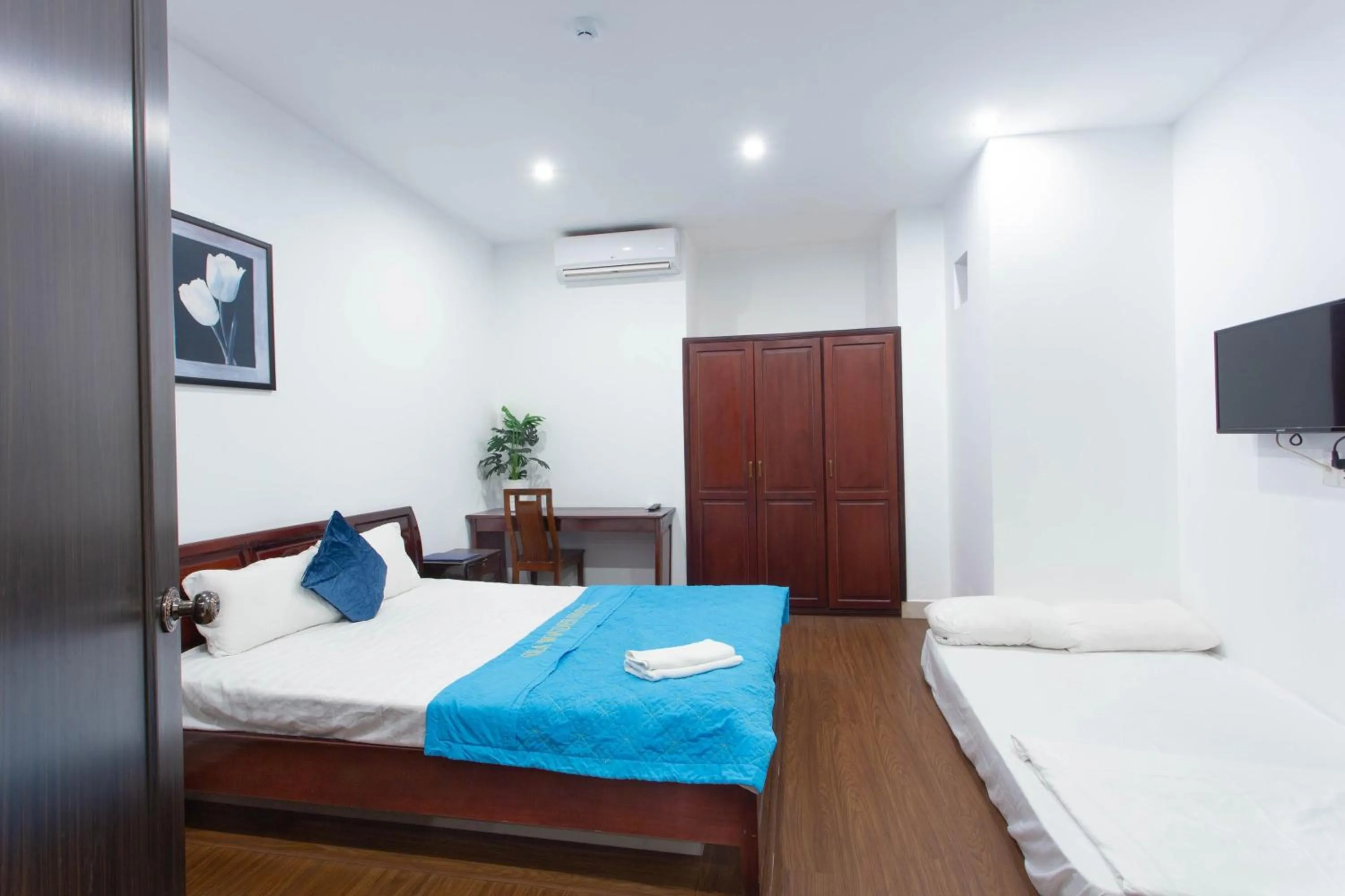 Bed in SKY APARTMENT & HOTEL