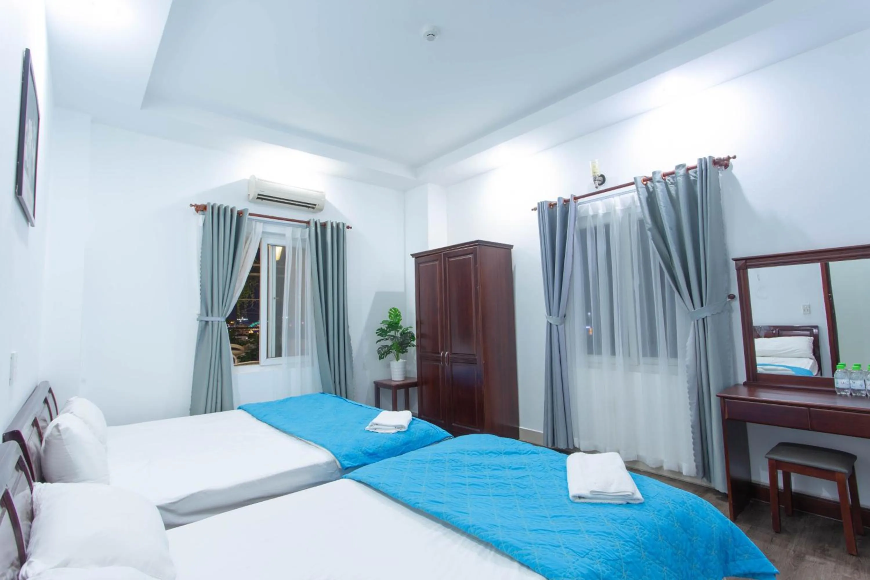 Bed in SKY APARTMENT & HOTEL