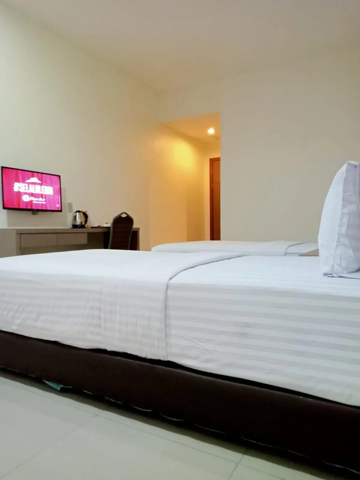 Bed in Putra Mulia Hotel Medan