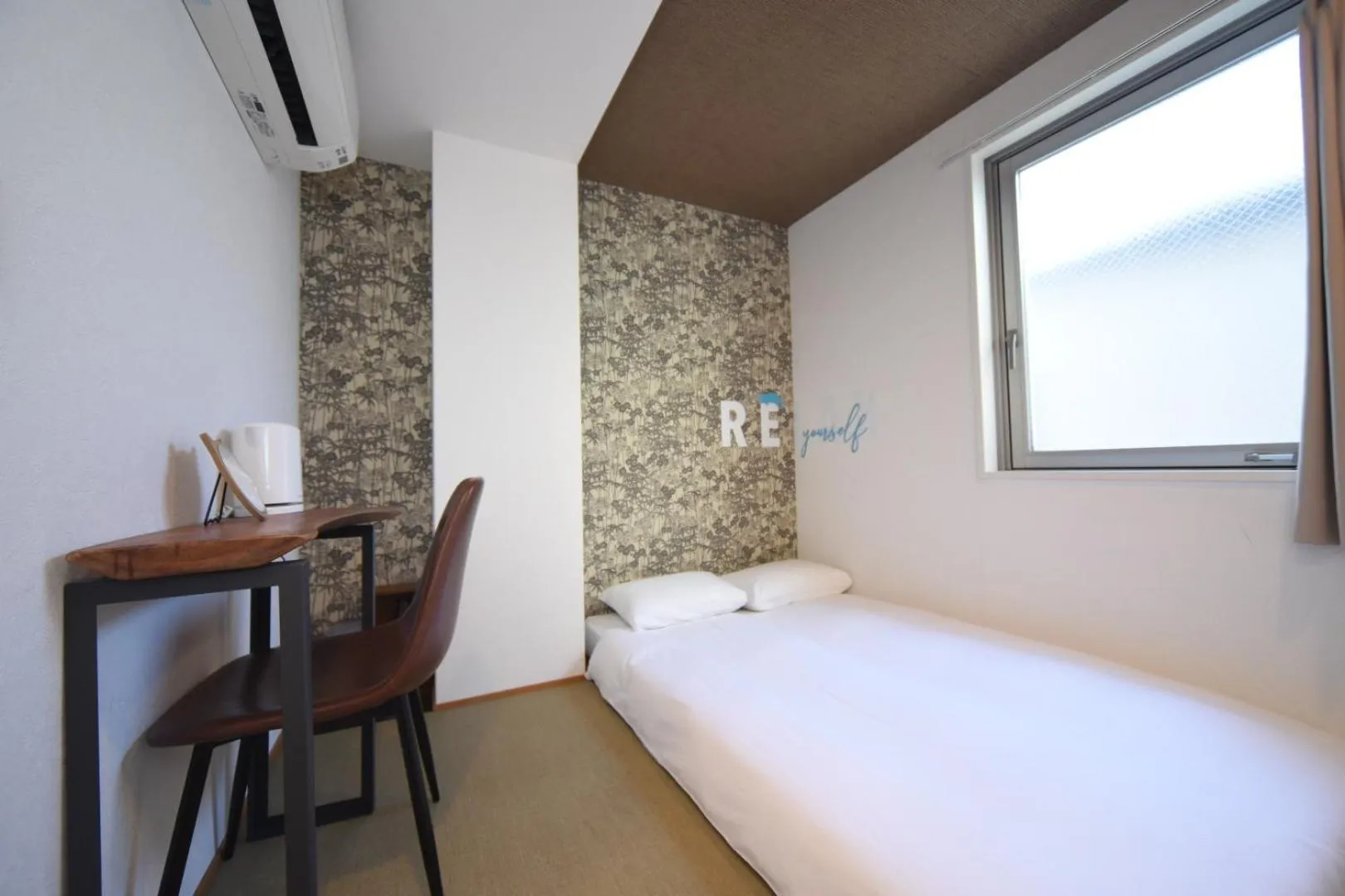 Bed in HOTEL WAN OSAKA EBISU