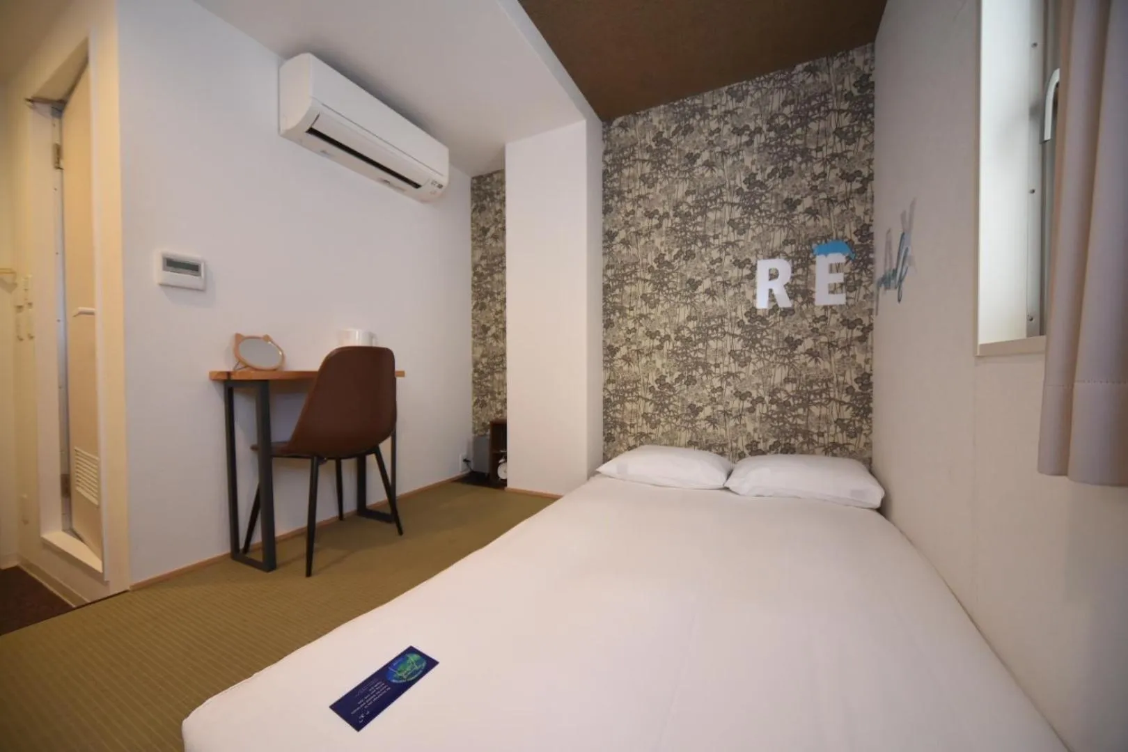 Bed in HOTEL WAN OSAKA EBISU