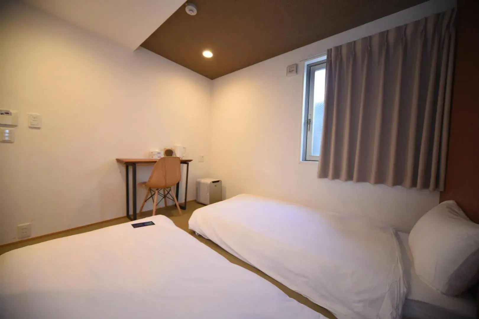 Bed in HOTEL WAN OSAKA EBISU Bed in HOTEL WAN OSAKA EBISU