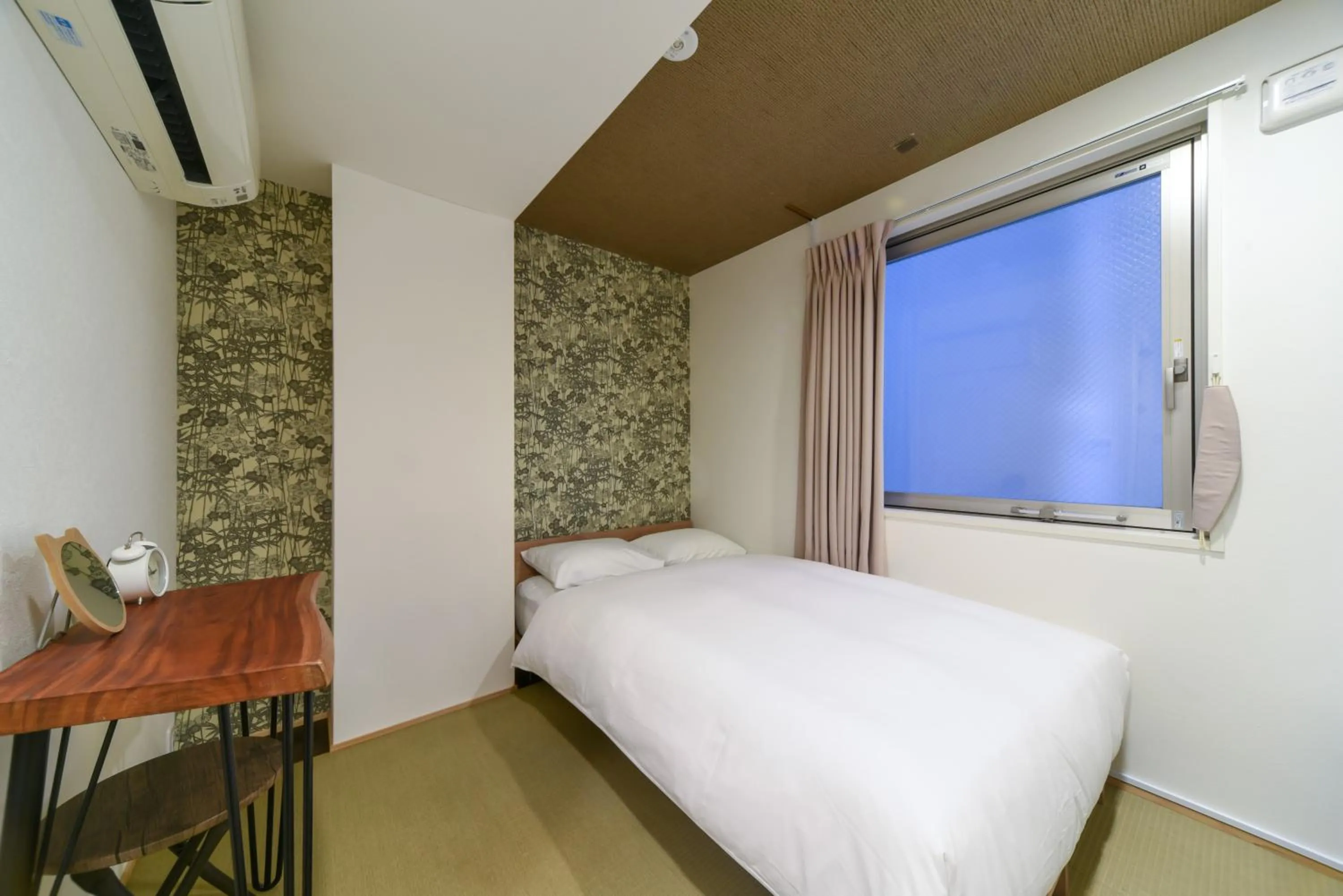 Bed in HOTEL WAN OSAKA EBISU