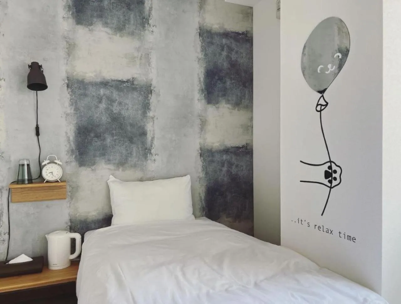 Bed in HOTEL WAN OSAKA EBISU