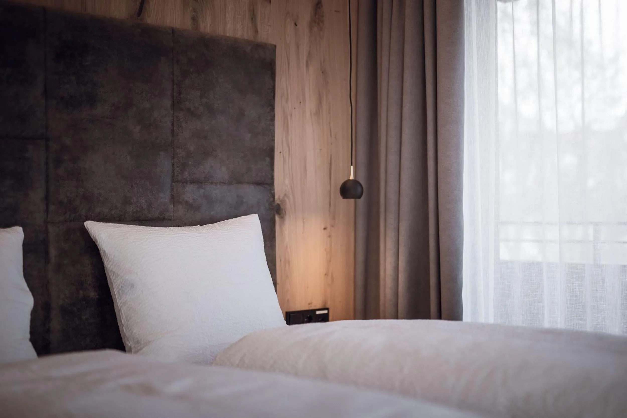 Bed in ROUDA luxury retreat am Kronplatz