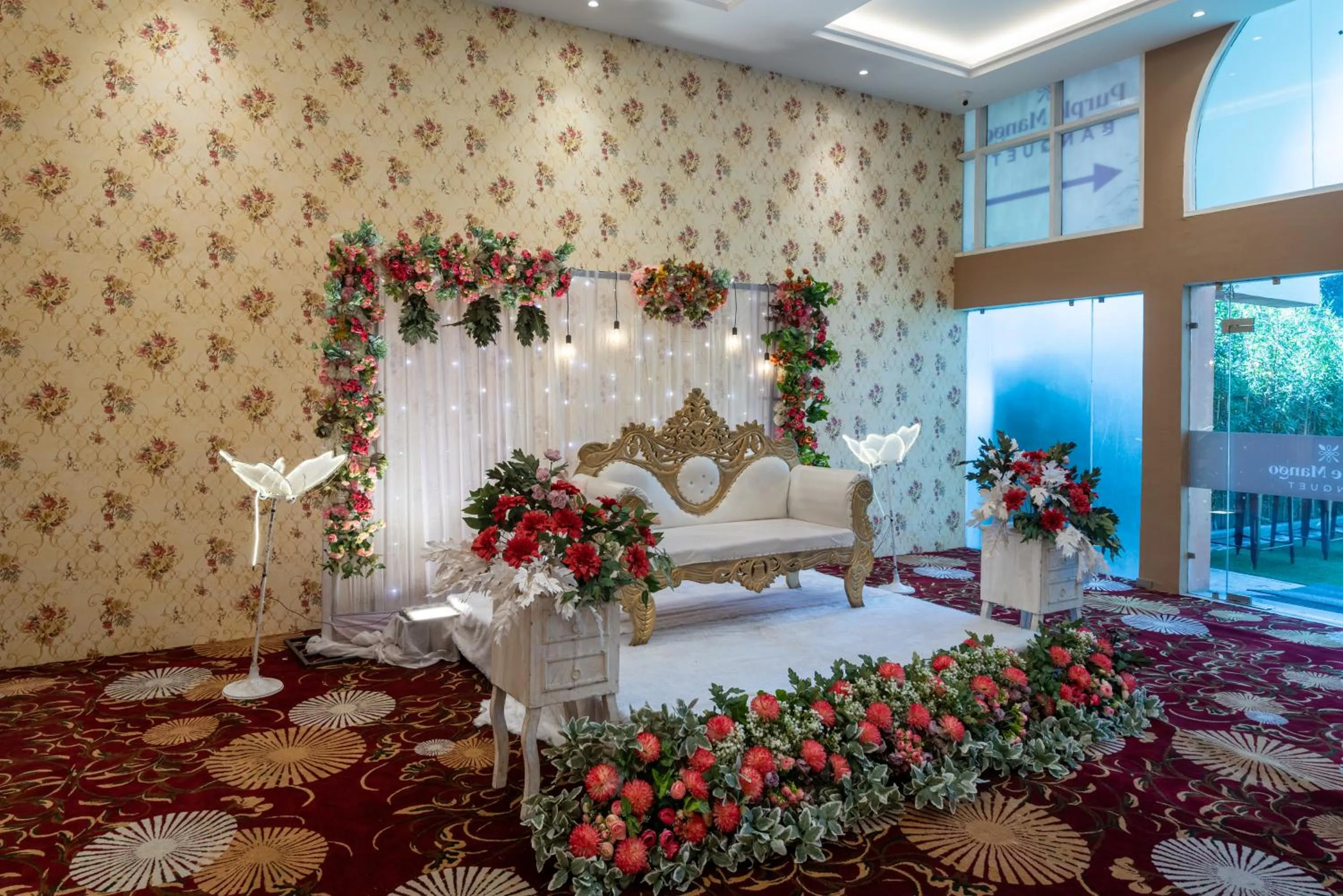 Bed in Mango Grove Hotel