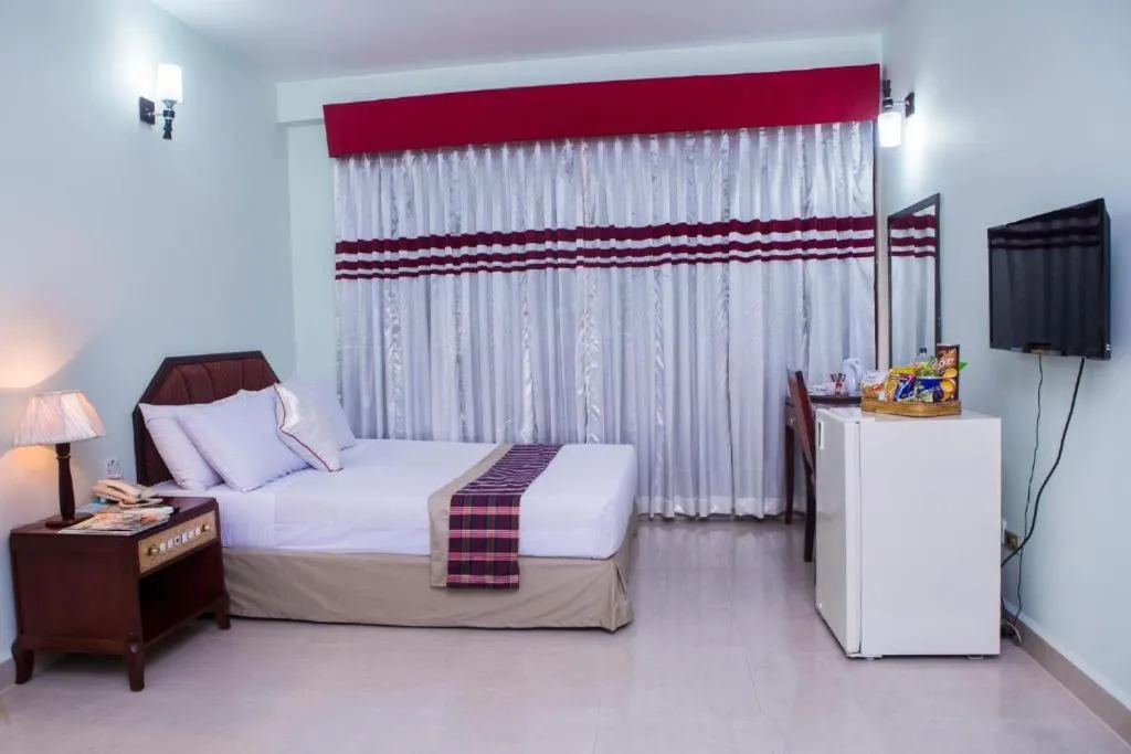 Bed in Meridian Hotel