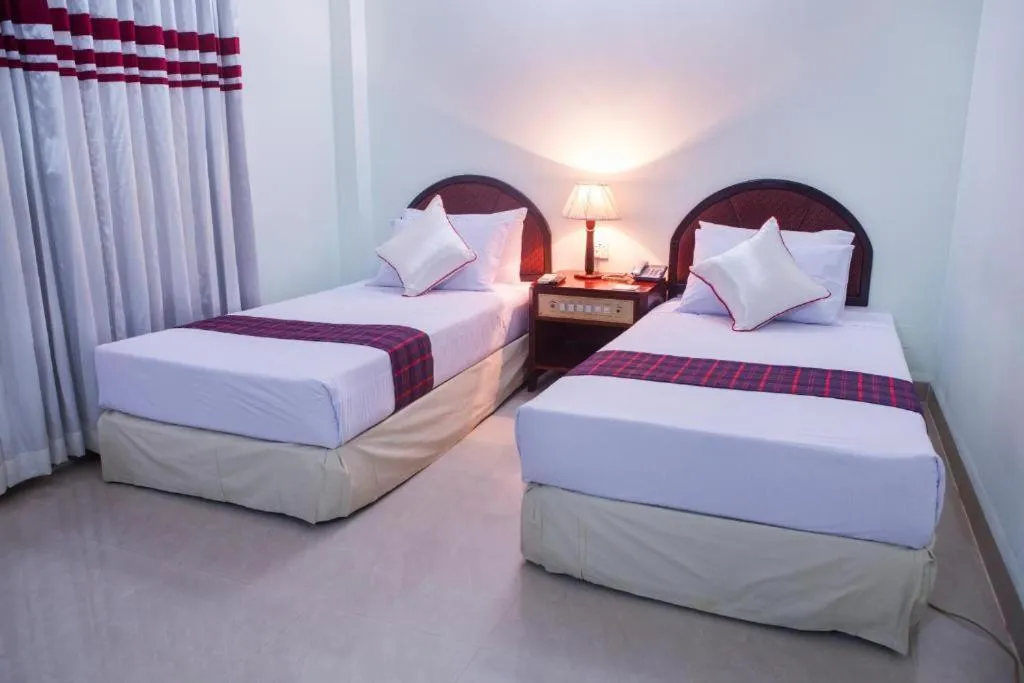 Photo of the whole room, Bed in Meridian Hotel