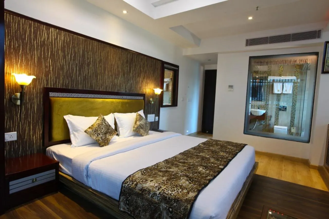 Bed in Hotel Tigers Roare Thekkady