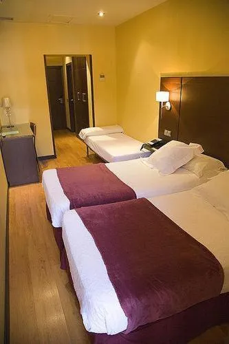 Photo of the whole room, Bed in Hostal Astoria