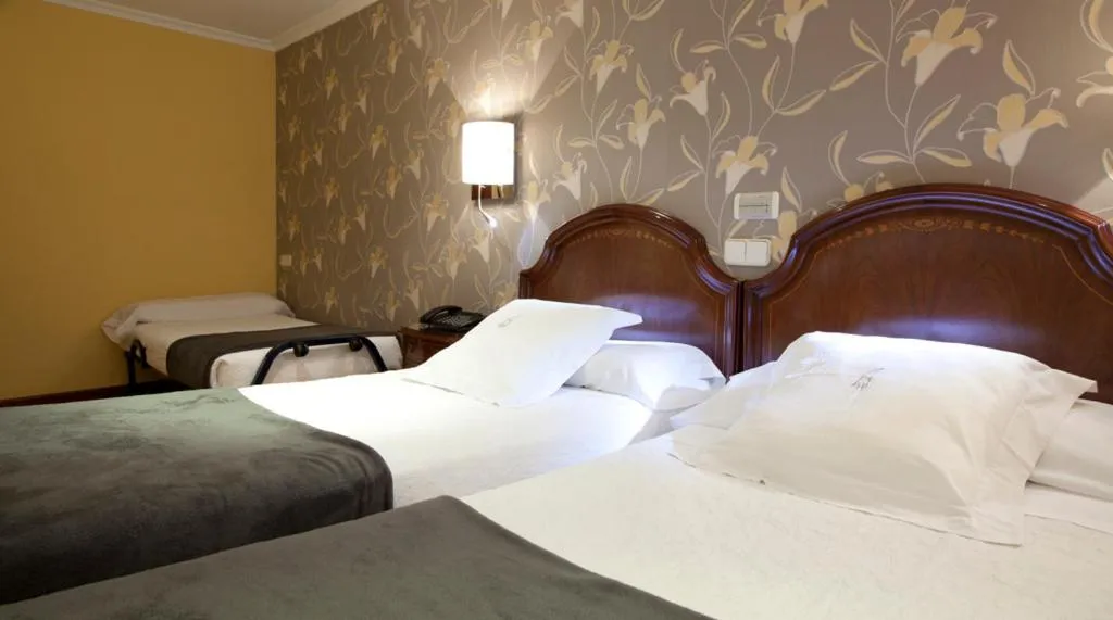 Photo of the whole room, Bed in Hostal Astoria