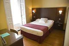 Photo of the whole room, Bed in Hostal Astoria