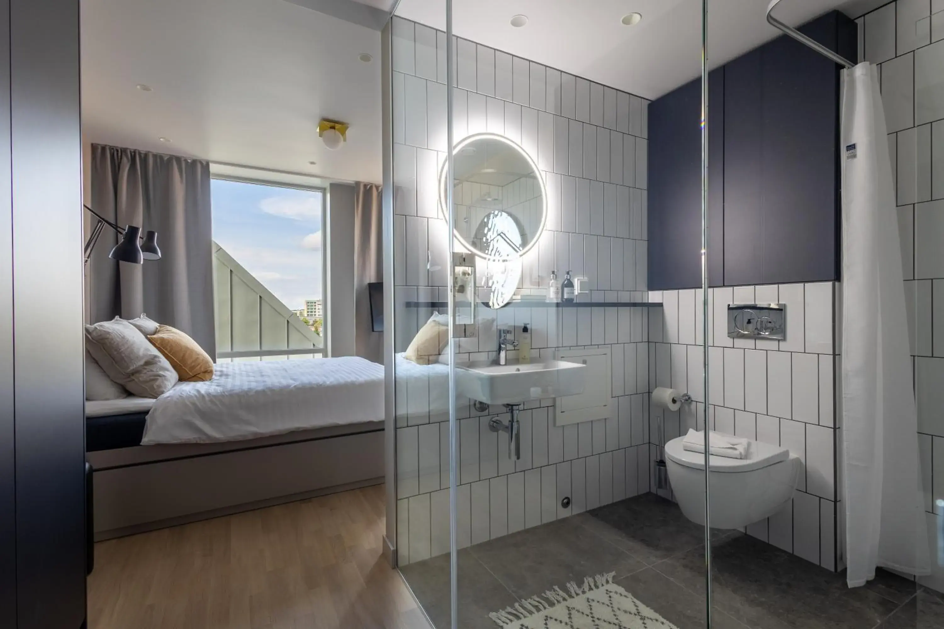Shower, Bed in Unity Malmö - A Studio Hotel Shower, Bed in Unity Malmö - A Studio Hotel