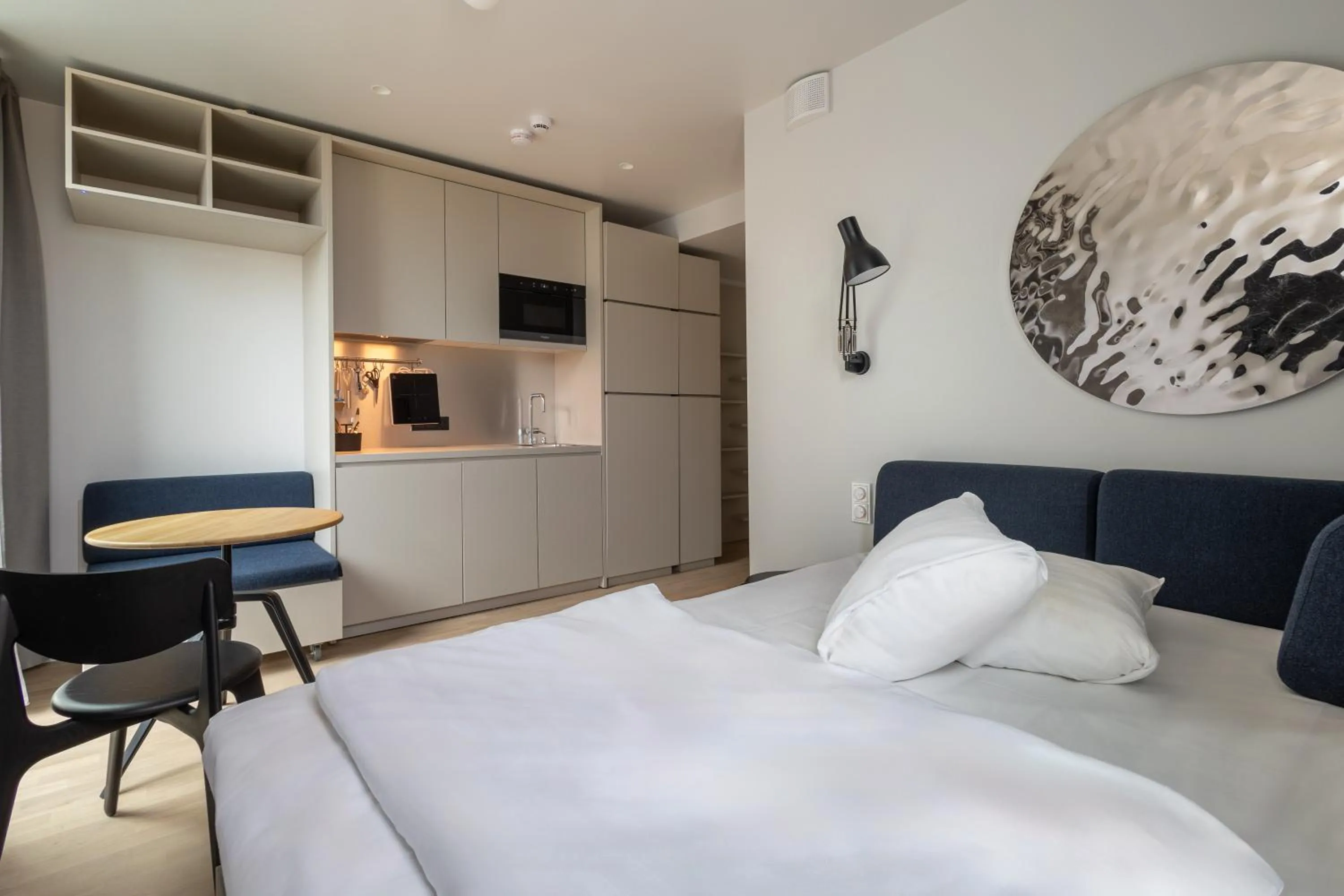 Bed in Unity Malmö - A Studio Hotel