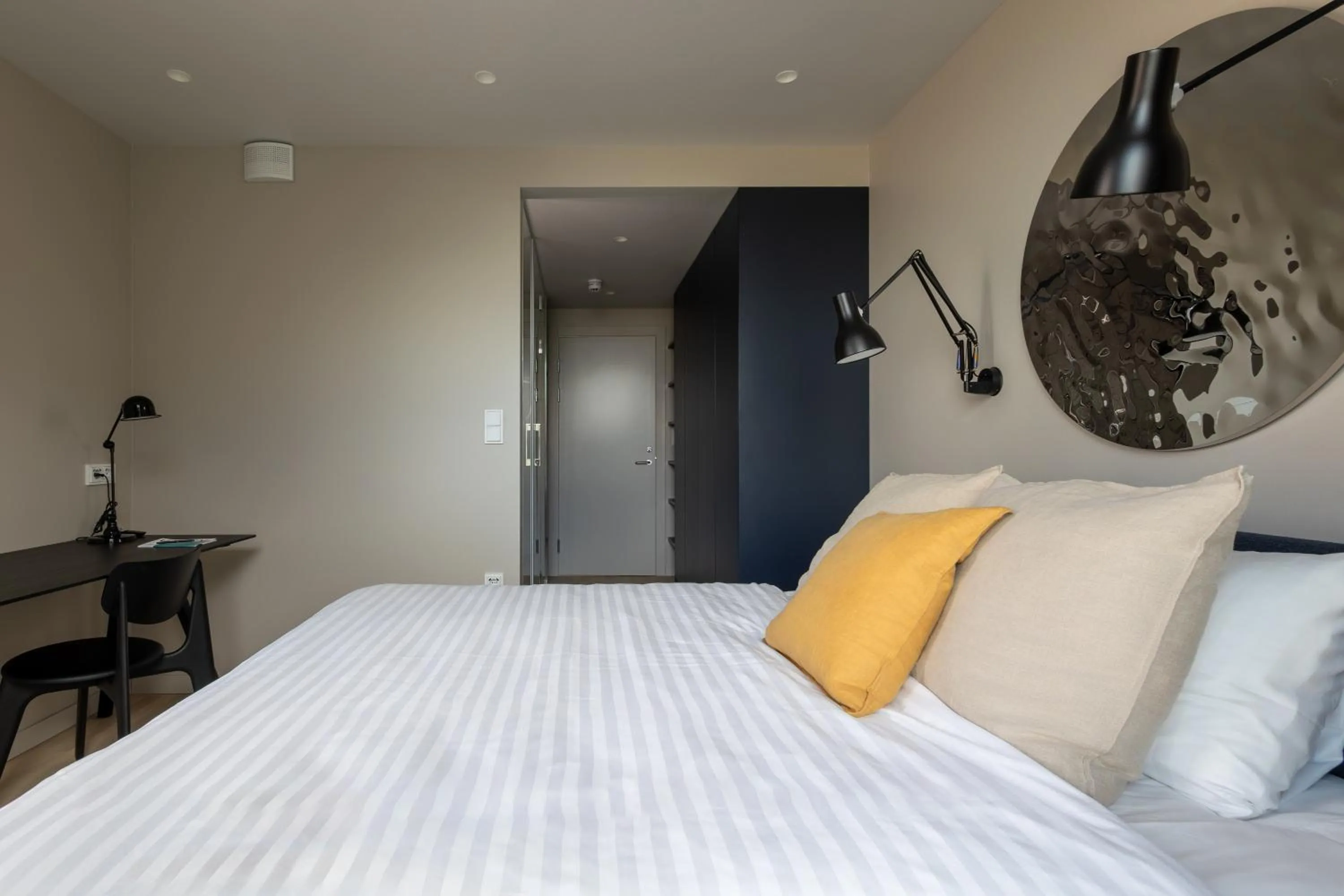 Bed in Unity Malmö - A Studio Hotel